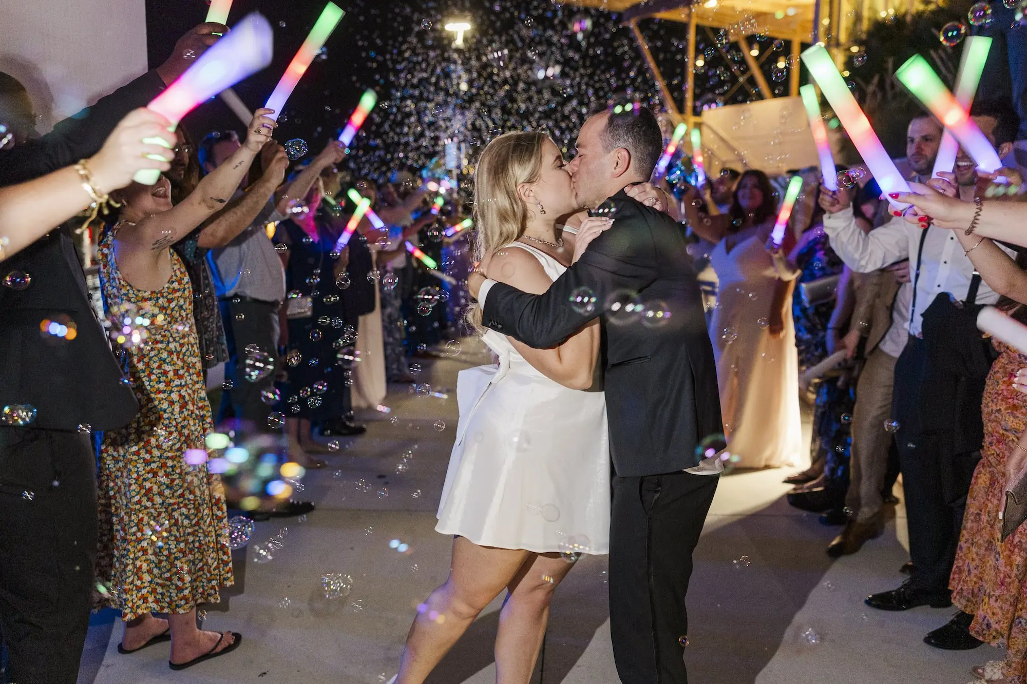 Bride and Groom Kissing in Bubble Goodbye Exit Portrait | Wedding Reception Second Short Dress Ideas | Tampa Bay DJ Graingertainment