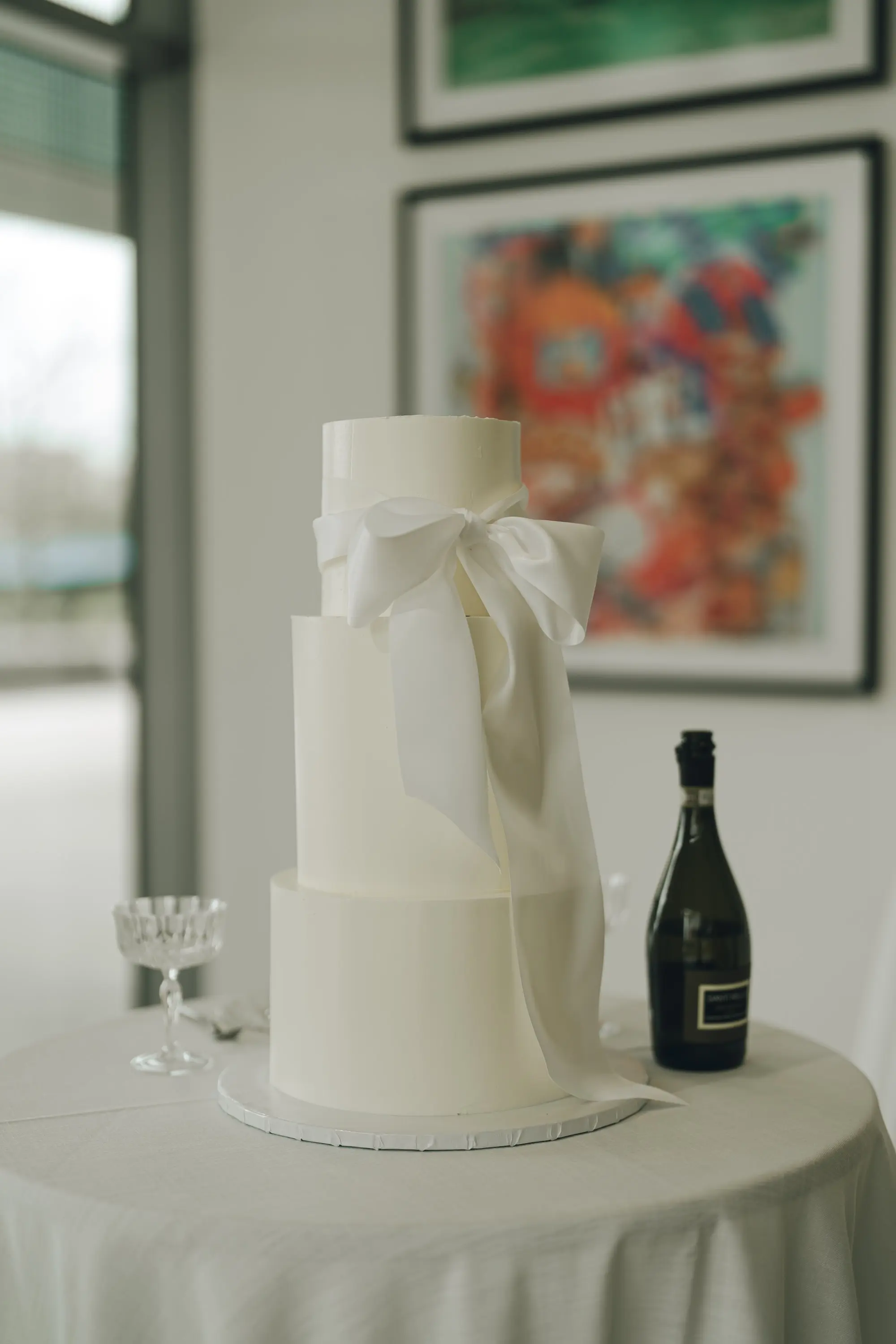 45Modern White Same Sex Lesbian Wedding Inspiration jpg - “Best Of” 2025: Wedding Receptions Part 2 Modern Three-Tiered Round White Wedding Cake with White Satin Bow Inspiration