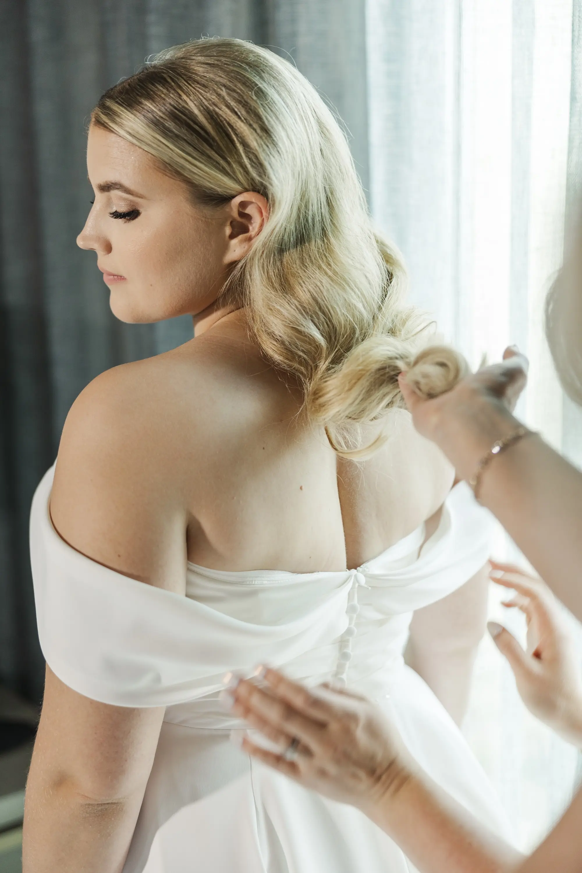 Bride Getting Ready Wedding Portrait | Timeless Stella York A-Line Wedding Gown with Off-the-Shoulder Neckline Inspiration | Effortless Soft Wave Curls Wedding Bridal Hair Ideas | Tampa Bay Photographer Mary Anna Photography