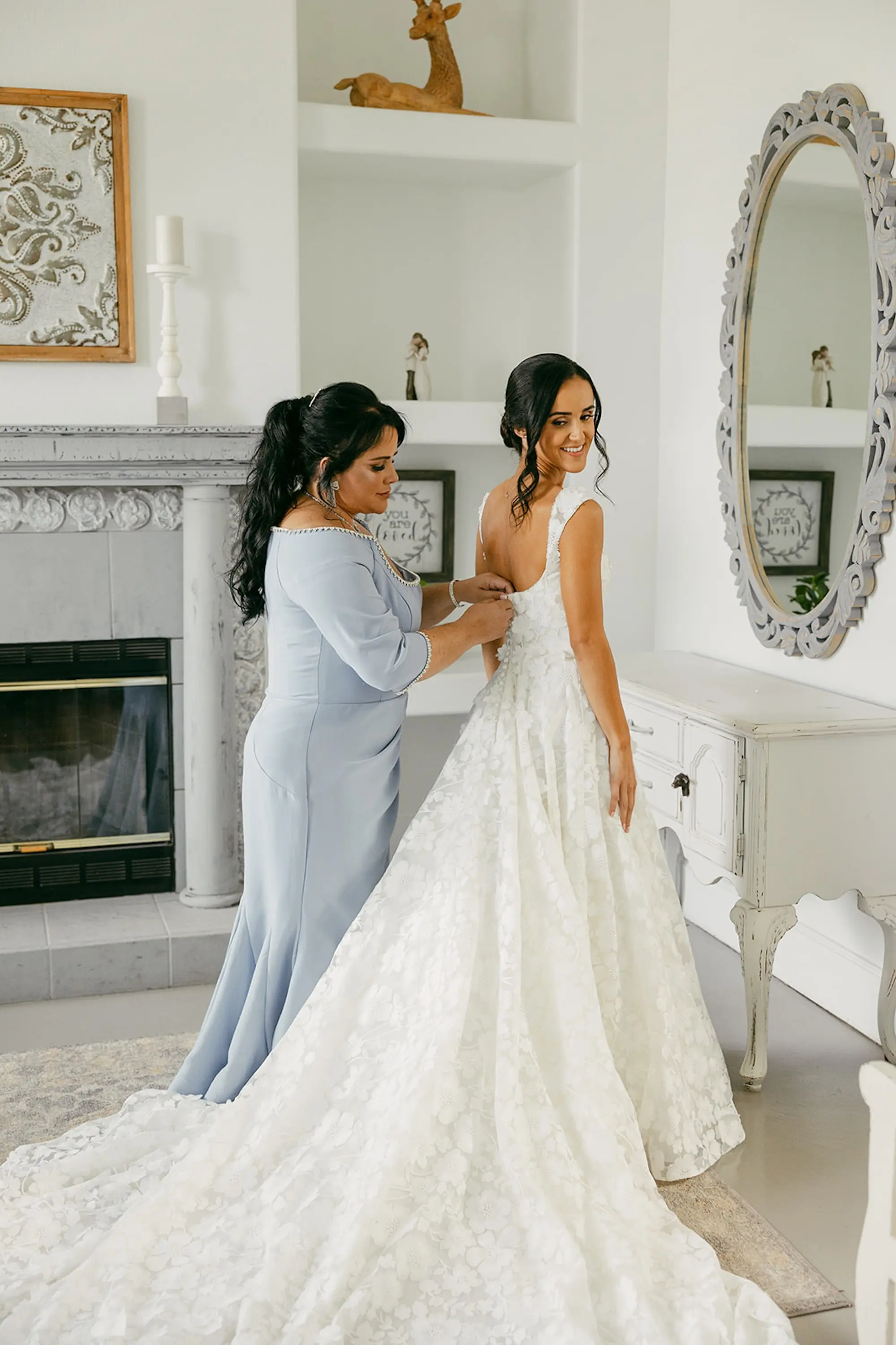 Bride and Mother Getting Dressed Wedding Portrait | White A-Line Ballgown Pronovias Wedding Dress with Delicate Flora Detailing Inspiration