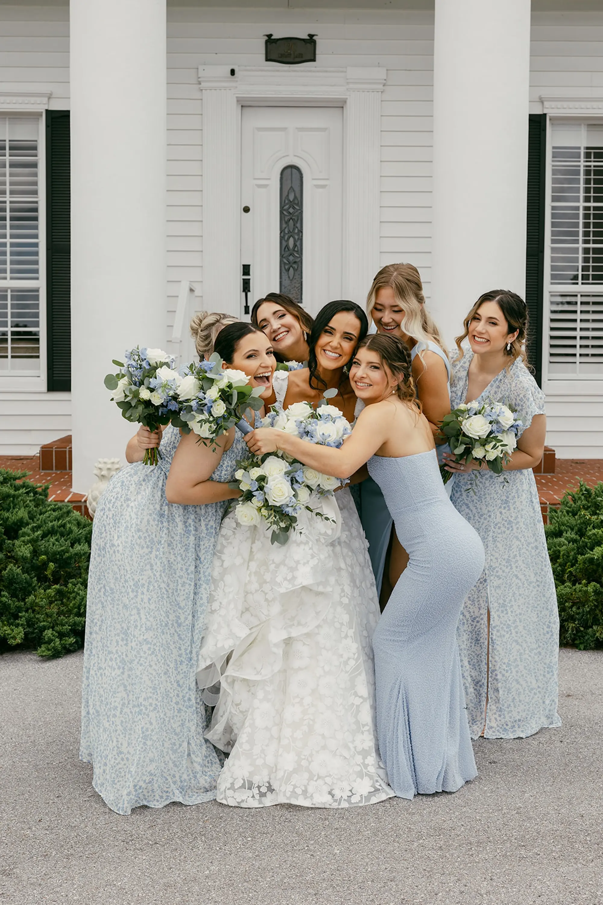 Bride with Bridesmaids Wedding Portrait | Mismatched Pastel Blue and Floral Bridesmaids Dress Inspiration | Tampa Bay Hair and Makeup Artist Adore Bridal Hair and Makeup