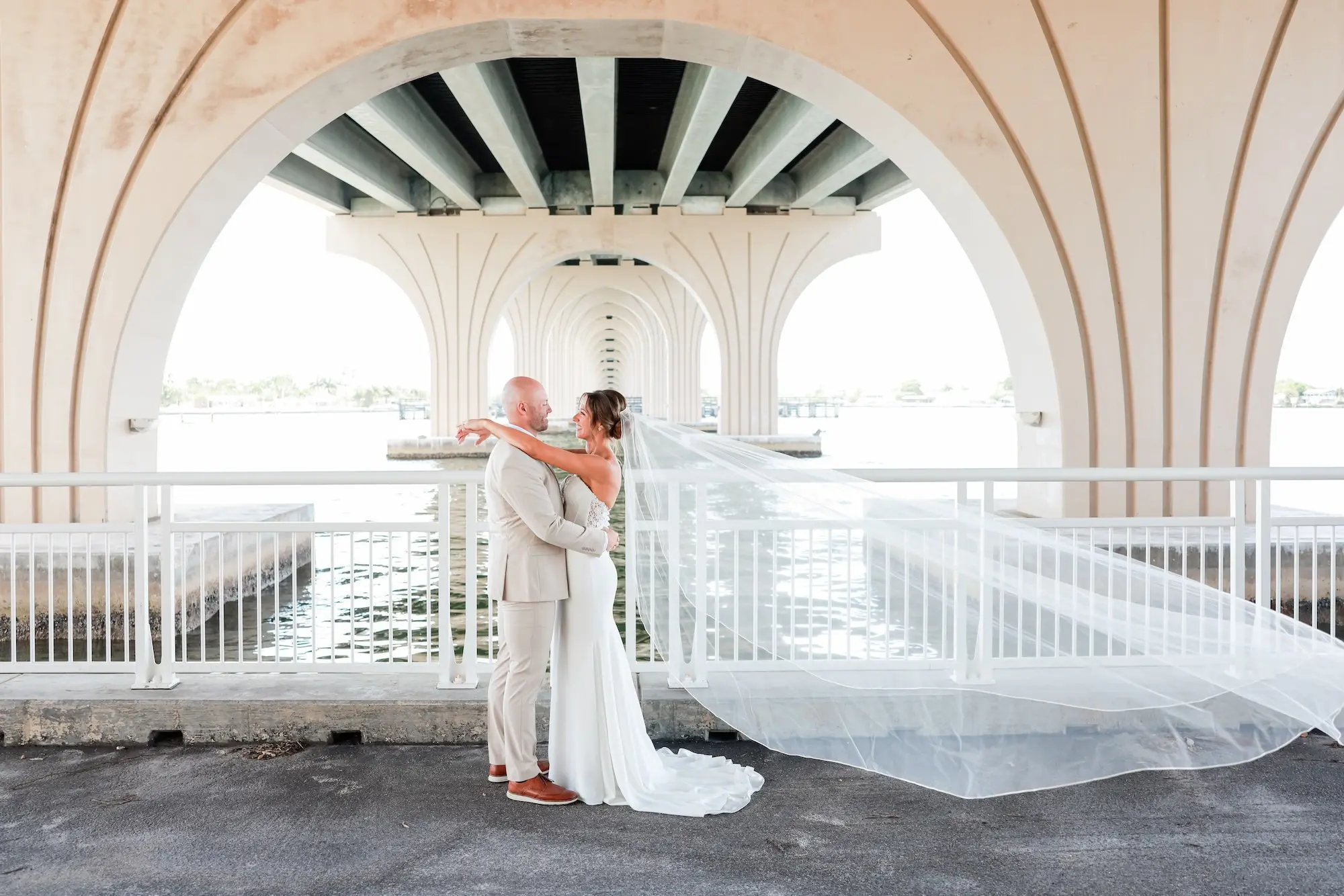 Bride and Groom Riverfront Wedding Portrait | Classic Long Veil Ideas | St Pete Photographer Lifelong Photography Studio