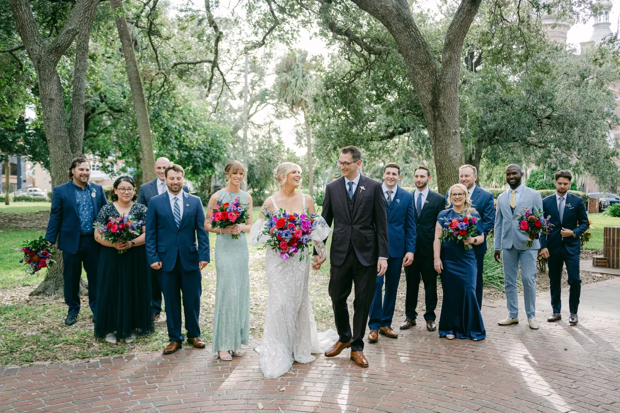 Vibrant Blue Wedding Party Attire Ideas | Mismatched Blue Bridesmaids Dress Inspiration | Groomsmen in Blue Suits Ideas