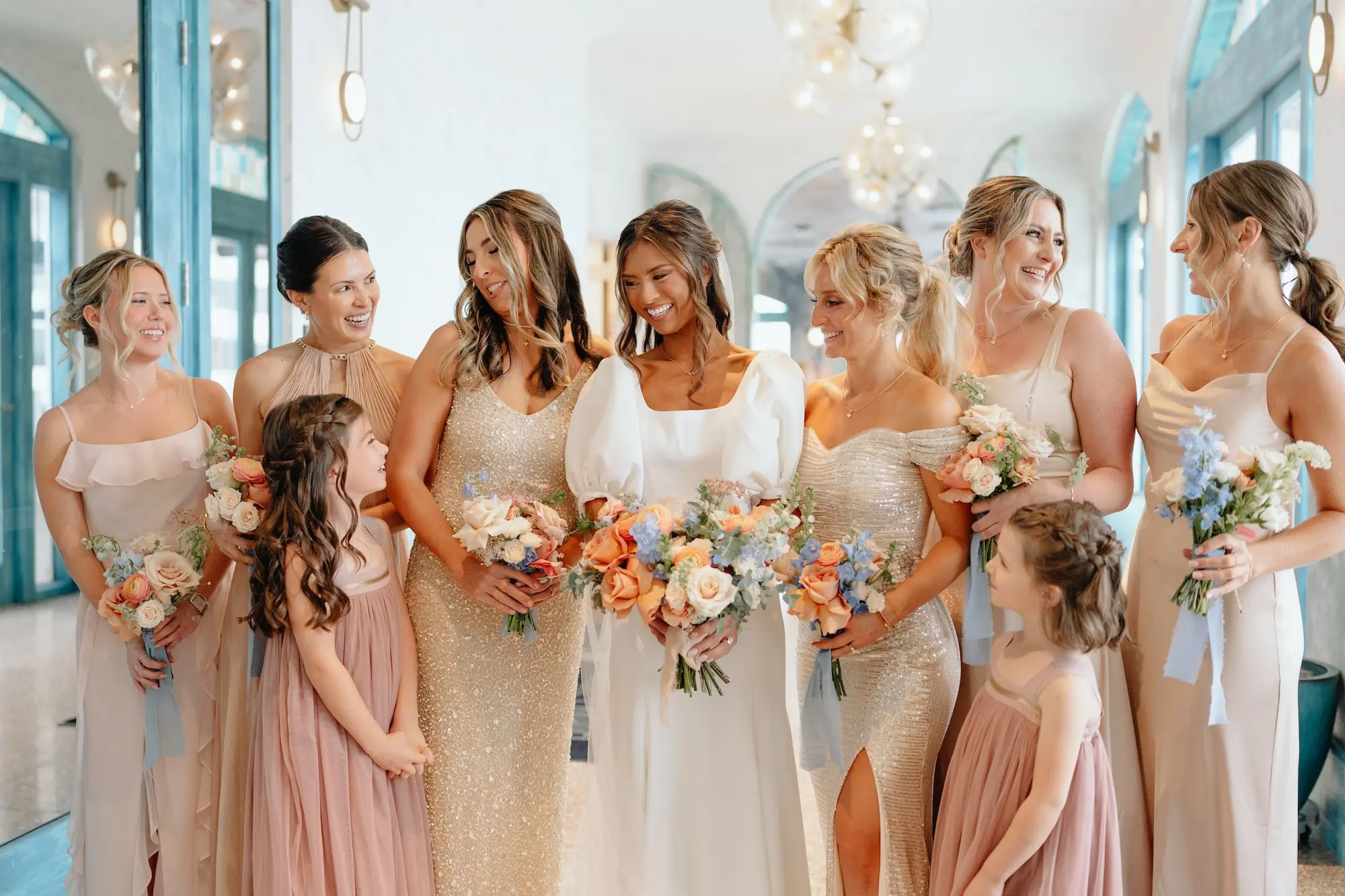Brides and Bridesmaids Wedding Portrait | Mismatched Neutral Champagne Bridesmaids Dress Inspiration | Soft Face Framing Curls Bridal Hair Ideas | Peach, White, Blue, Dusty Pink, Flower Bouquet Inspiration | Tampa Bay Hair and Makeup Artist Femme Akoi Beauty Studio