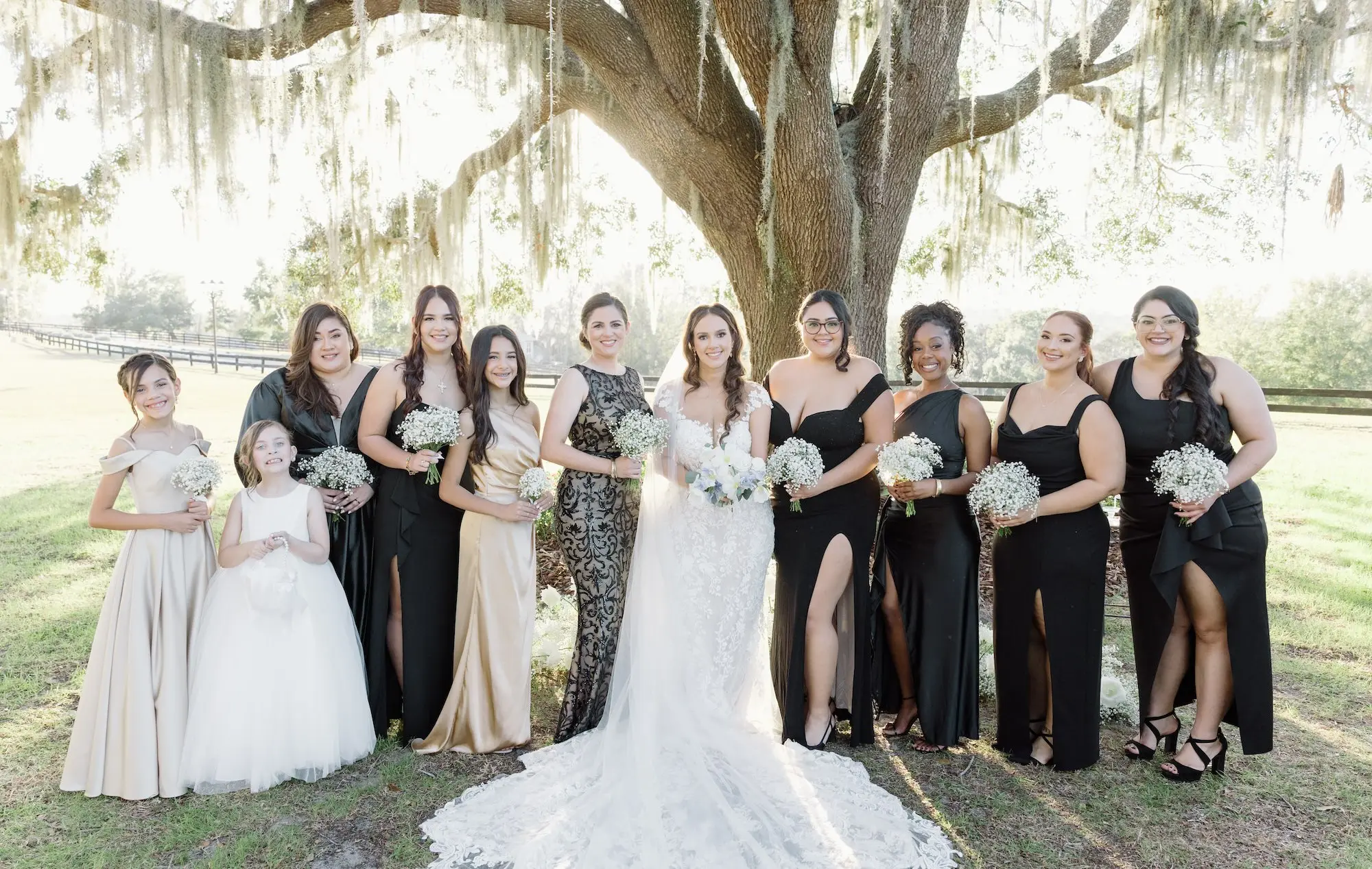 Bride and Bridesmaid Outdoor Estate Wedding Portrait | Different Style Black Bridesmaid Dresses Inspiration | Baby's Breath Bouquet Ideas