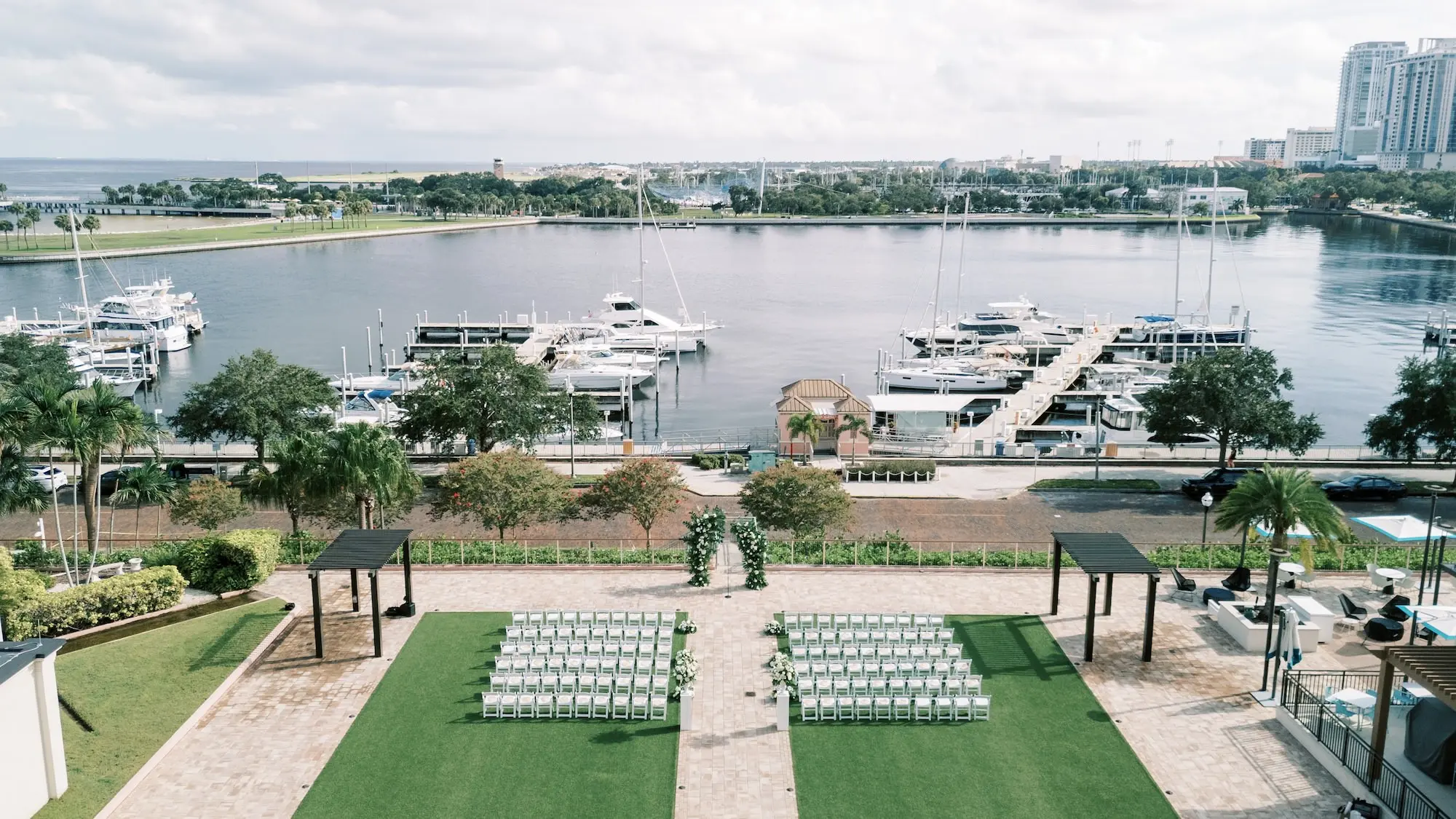 White and Green Elegant Tropical Terrace Wedding Ceremony Inspiration | St Pete Event Venue The Vinoy | Tampa Bay Kate Ryan Event Rentals | Florist Lemon Drops