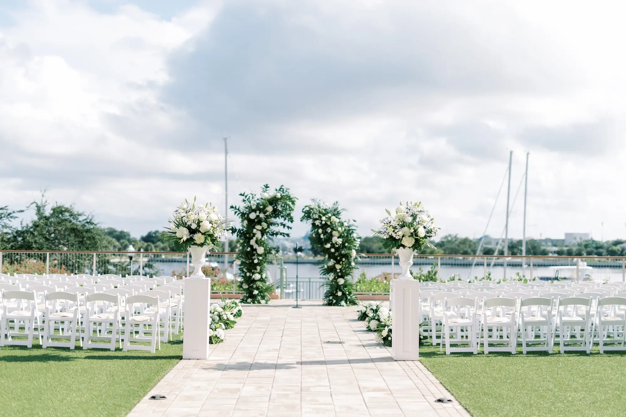 White and Green Elegant Tropical Terrace Wedding Ceremony Arch Inspiration | St Pete Event Venue The Vinoy | Tampa Bay Kate Ryan Event Rentals | Florist Lemon Drops