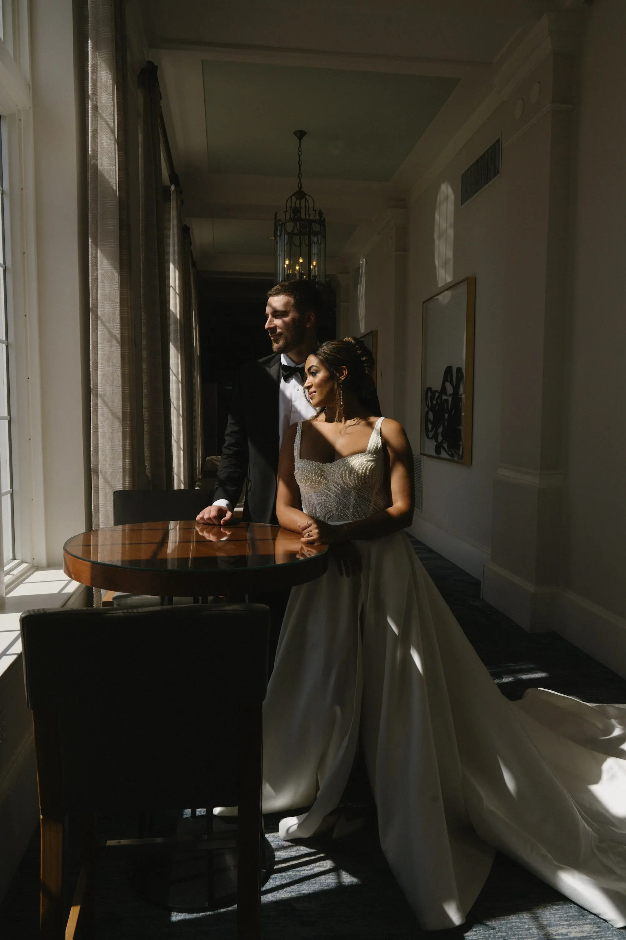 Bride and Groom Wedding Portrait in Lobby of Historic St Pete Beach Wedding Venue Don CeSar | Photographer Amber Yonker Photography