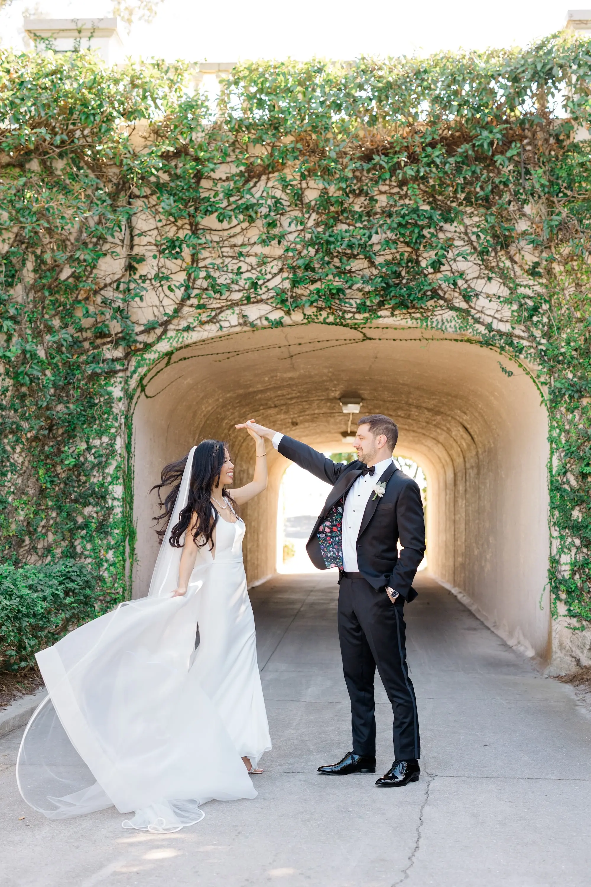 14Romantic Pastel and Navy Sarasota Wedding Inspiration jpg - Timeless Gold and Green Sarasota Wedding | Lakewood Ranch Golf & Country Club Bride and Groom Twirling Wedding Portrait | Elegant Paloma Blanca Wedding Gown with Traditional Chapel Length Tulle Veil Inspiration | Susan Elizabeth Weddings Tampa Wedding Photographer