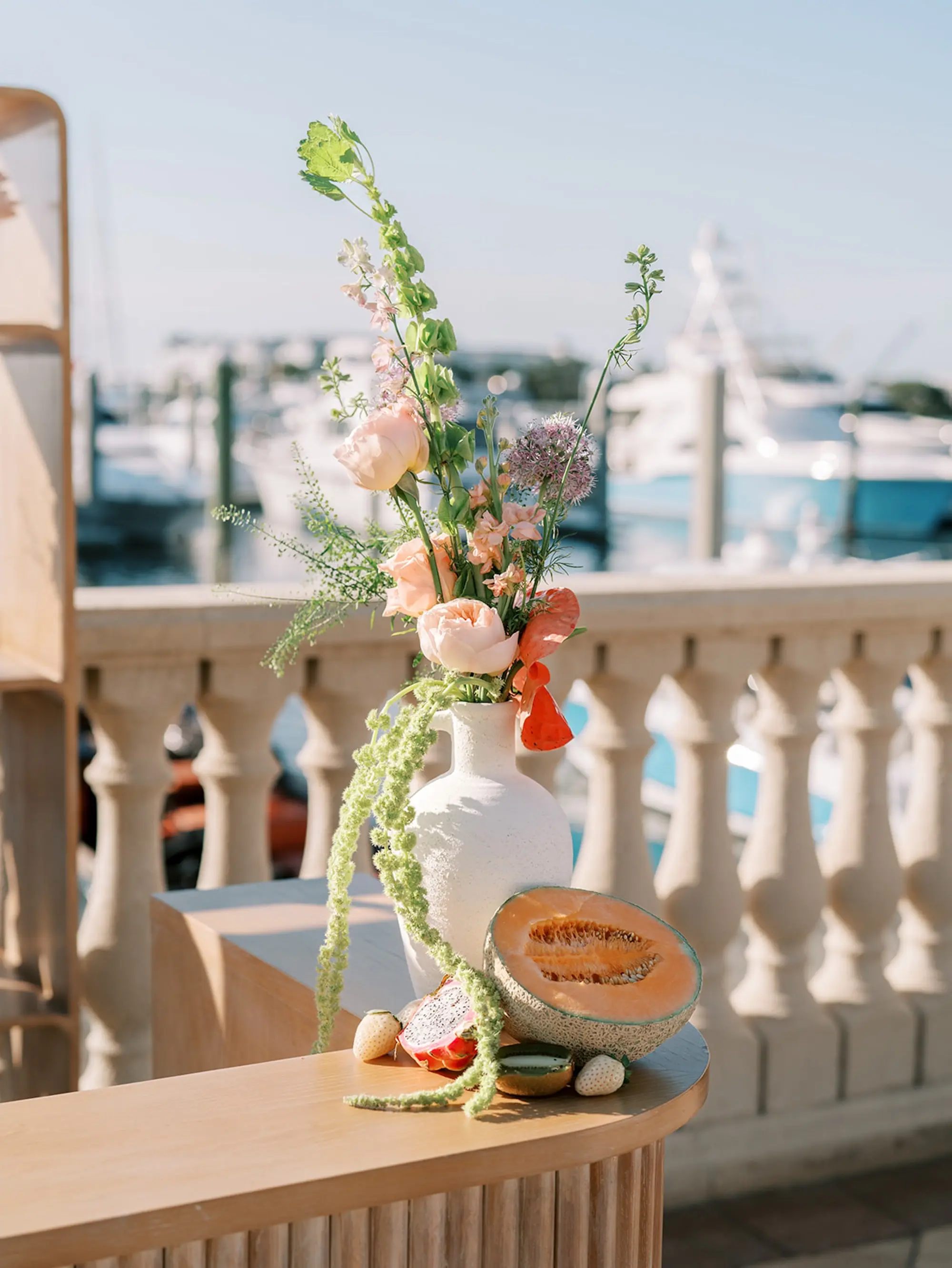 19Elegant Pastel Tropical Wedding Inspriation jpg - “Best Of” 2025: Wedding Receptions Part 2 Wedding Reception White Washed Wood Bar with White Vases of Tropical Coral, Pink and White Orchids, Anthium, Ranunculus Reception Centerpiece Inspiration | Vibrant Fruit Dragon Fruit, Kiwi, Melon Table Decor Ideas | Tampa Bay Florist Save The Date Florida | Central Florida Event Planner MDP Events