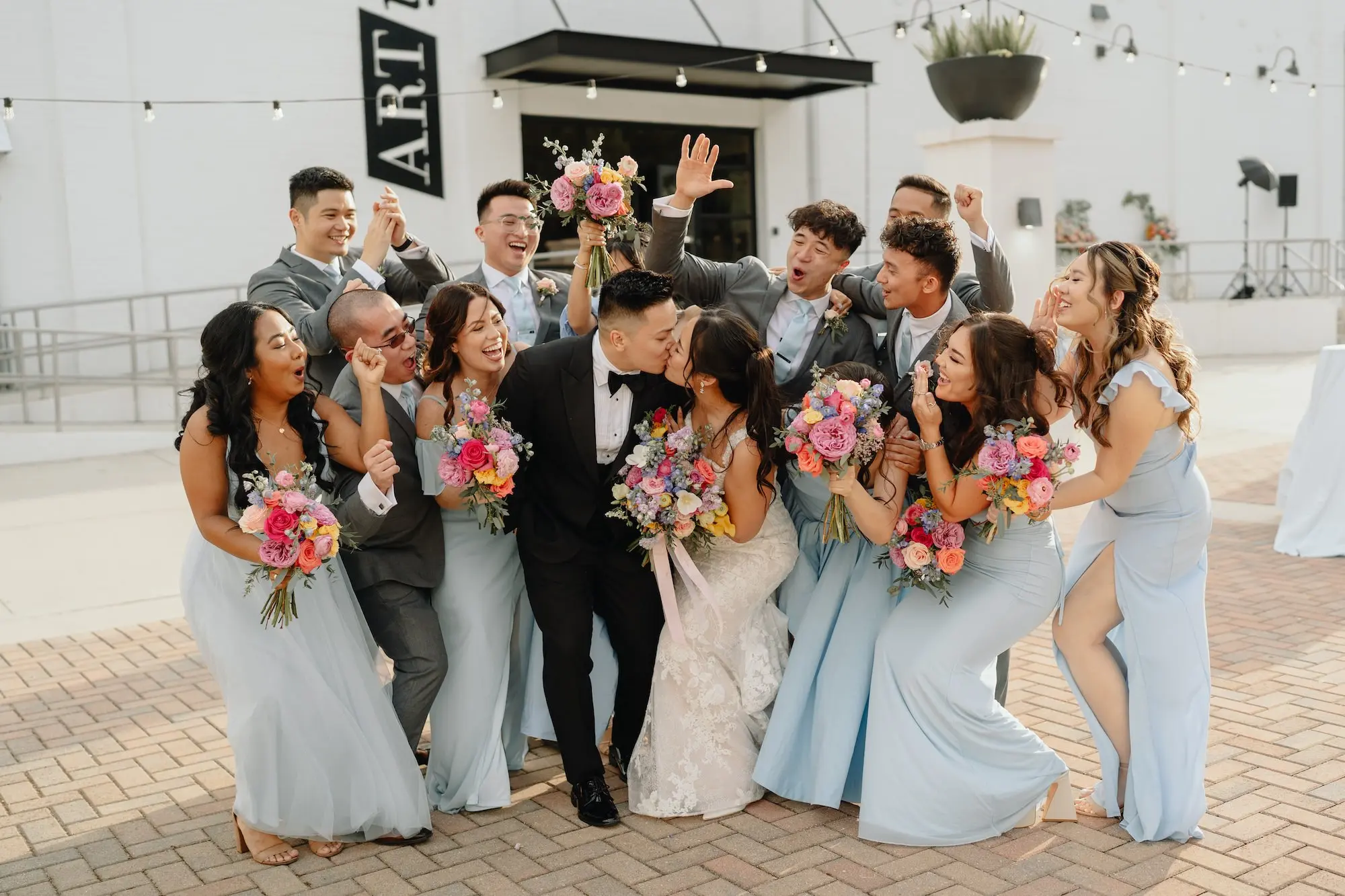 Spring Bridal Party Wedding Attire Inspiration | Mismatched Blue Bridesmaids Dresses, Groomsmen in Gray Suit Ideas