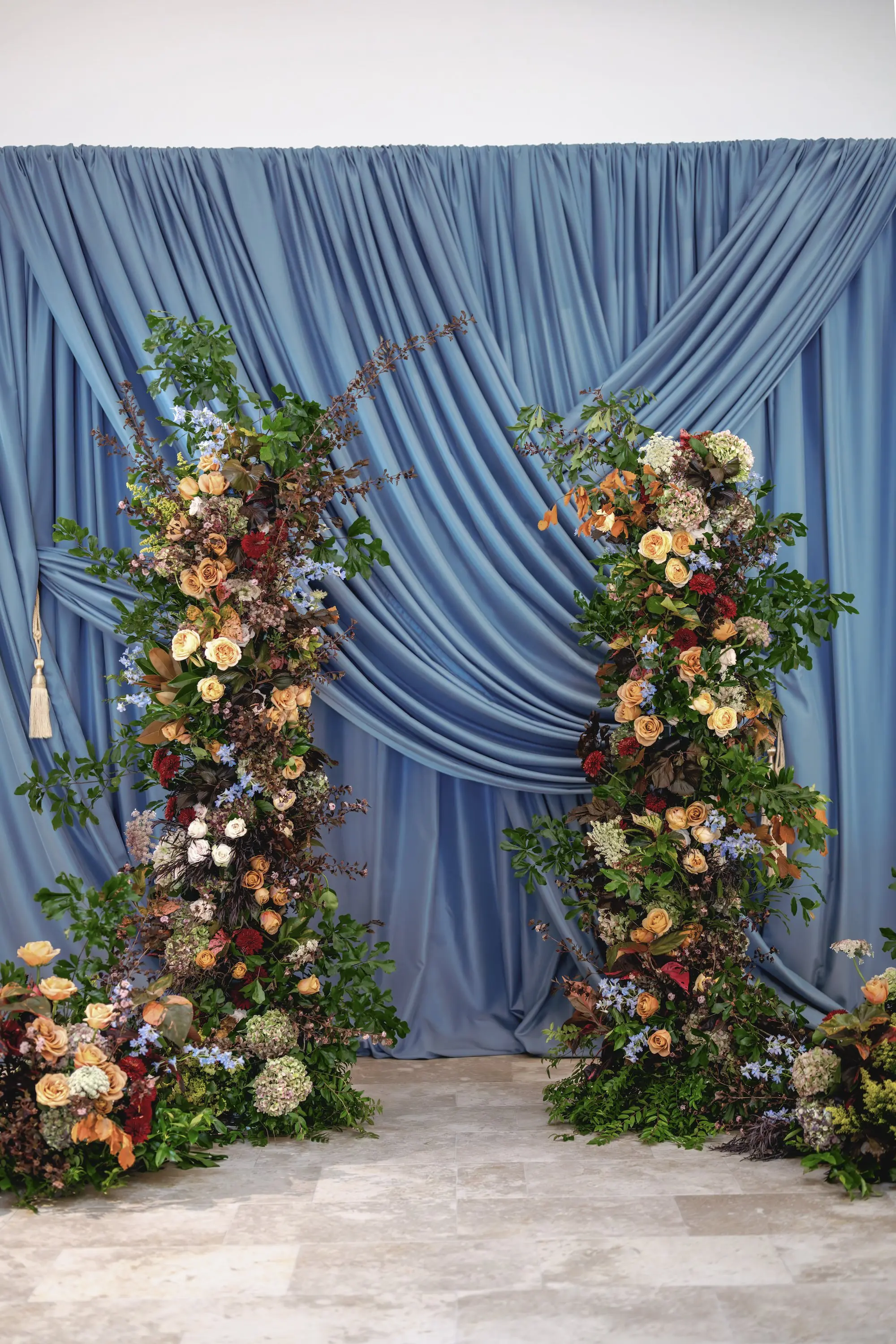 Floral Columns Wedding Ceremony Altar Decor Inspiration | Floral Arrangement Aisle Decor Ideas | Dusty Blue Wall Drapings Ideas | St Pete Florist Bruce Wayne Florals | Florida Luxury Planner Parties A'La Carte