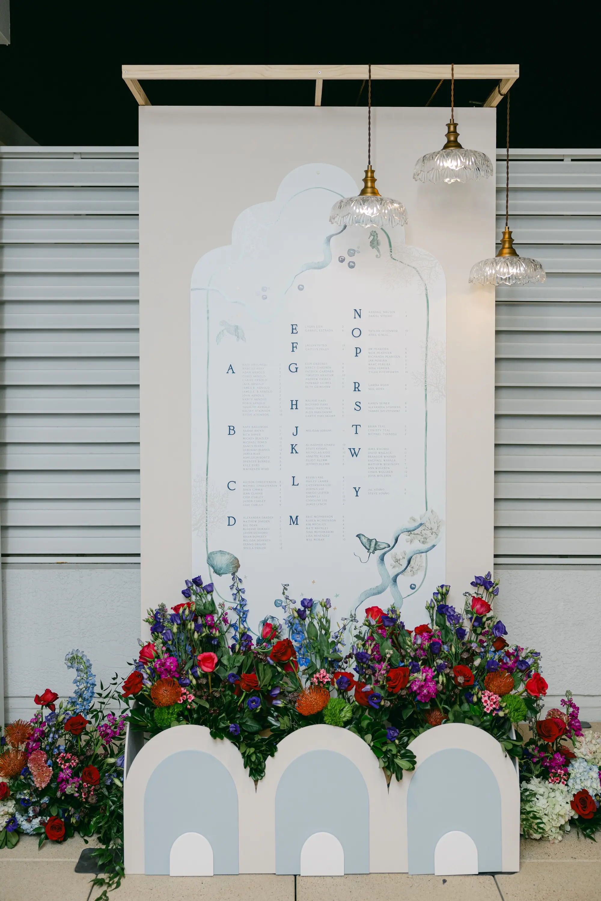 Vibrant Jewel-Toned Wedding Reception Floral Arrangement Decor Ideas | Wall Size Wooden Seating Chart Display Inspiration