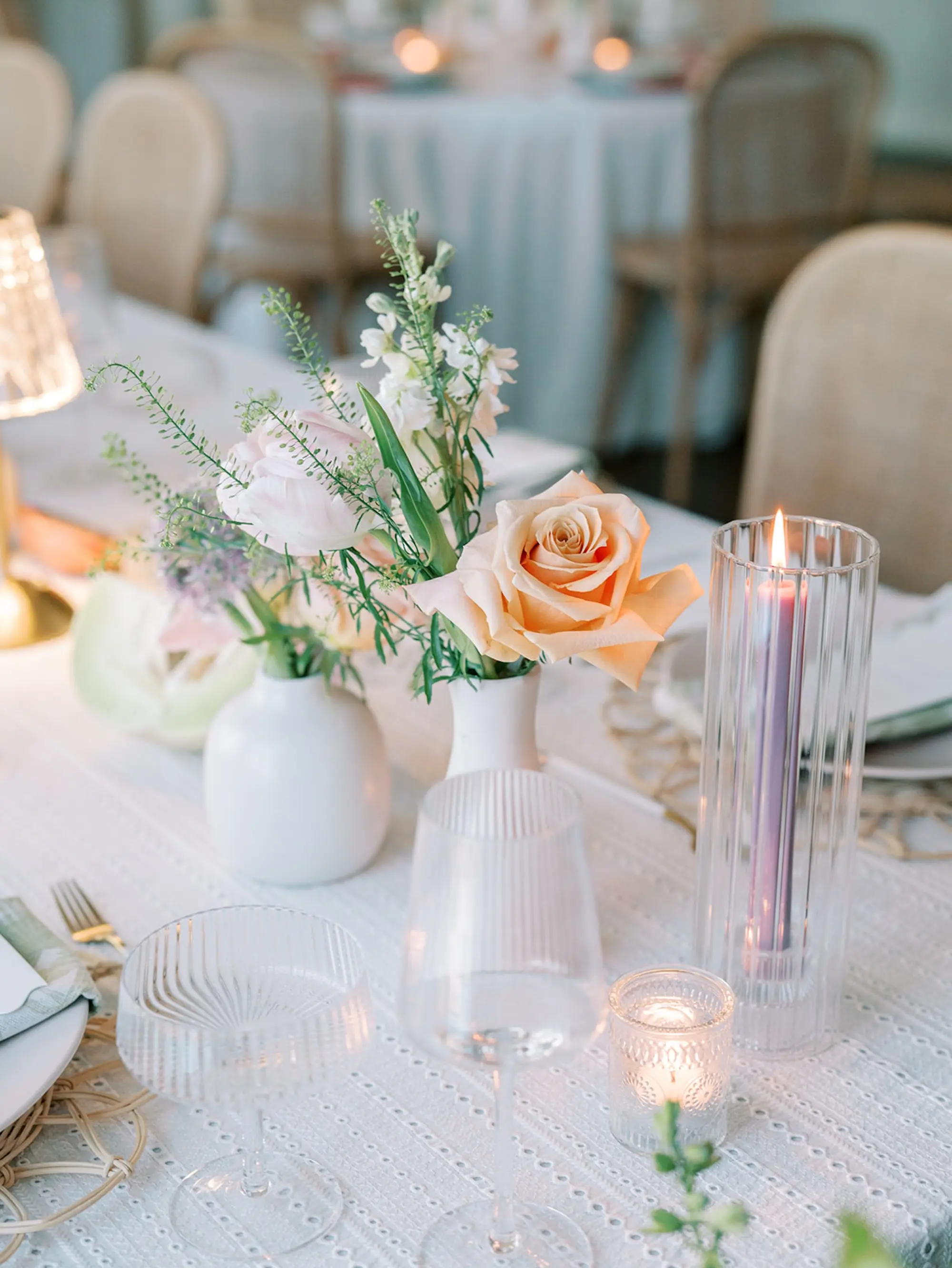 28Elegant Pastel Tropical Wedding Inspriation jpg - “Best Of” 2025: Wedding Receptions Part 2 Wedding Reception Tables with Wicker Chairs with White Textured Linens with Bud Vases and Romantic Tea Candles Reception Decor Inspiration | Tropical Coral, Pink and White Orchids, Anthium, Ranunculus in White Bud Vases Centerpiece Ideas | Colored Taper Candles in Textured Glass Vases Inspiration | Tampa Bay Florist Save The Date Florida | Central Florida Event Planner MDP Events | Tampa Bay Over The Top Rental Linens