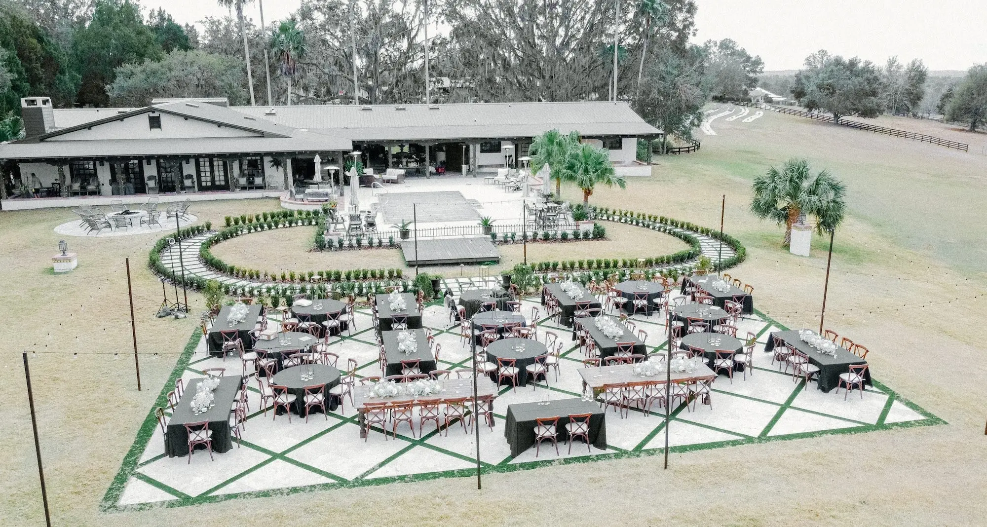 Outdoor European Inspired Black and White Winter Wedding with Travertine Terrace Reception Inspiration | Brooksville Event Venue La Hacienda on Snow Hill