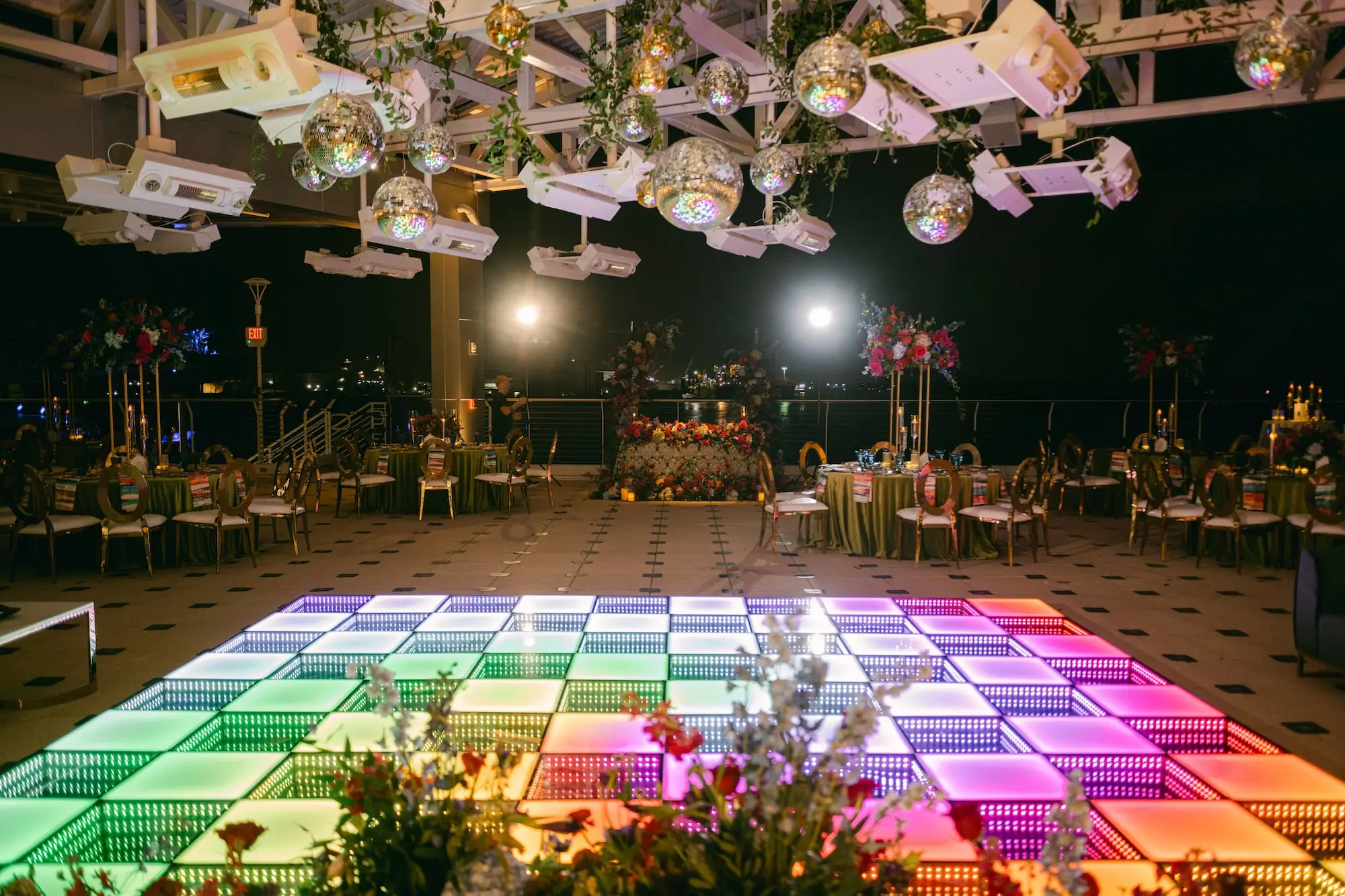 Vibrant Jewel-Toned Wedding Reception Decor Ideas | Tampa Bay DJ Co | Content Creator Behind The Vows | Disco Balls Wedding Reception Decor Inspiration | Light Up Multi-Color Clear Dance Floor Ideas | Tampa Bay Event Venue Florida Aquarium | Planner Blue Skies Weddings and Events