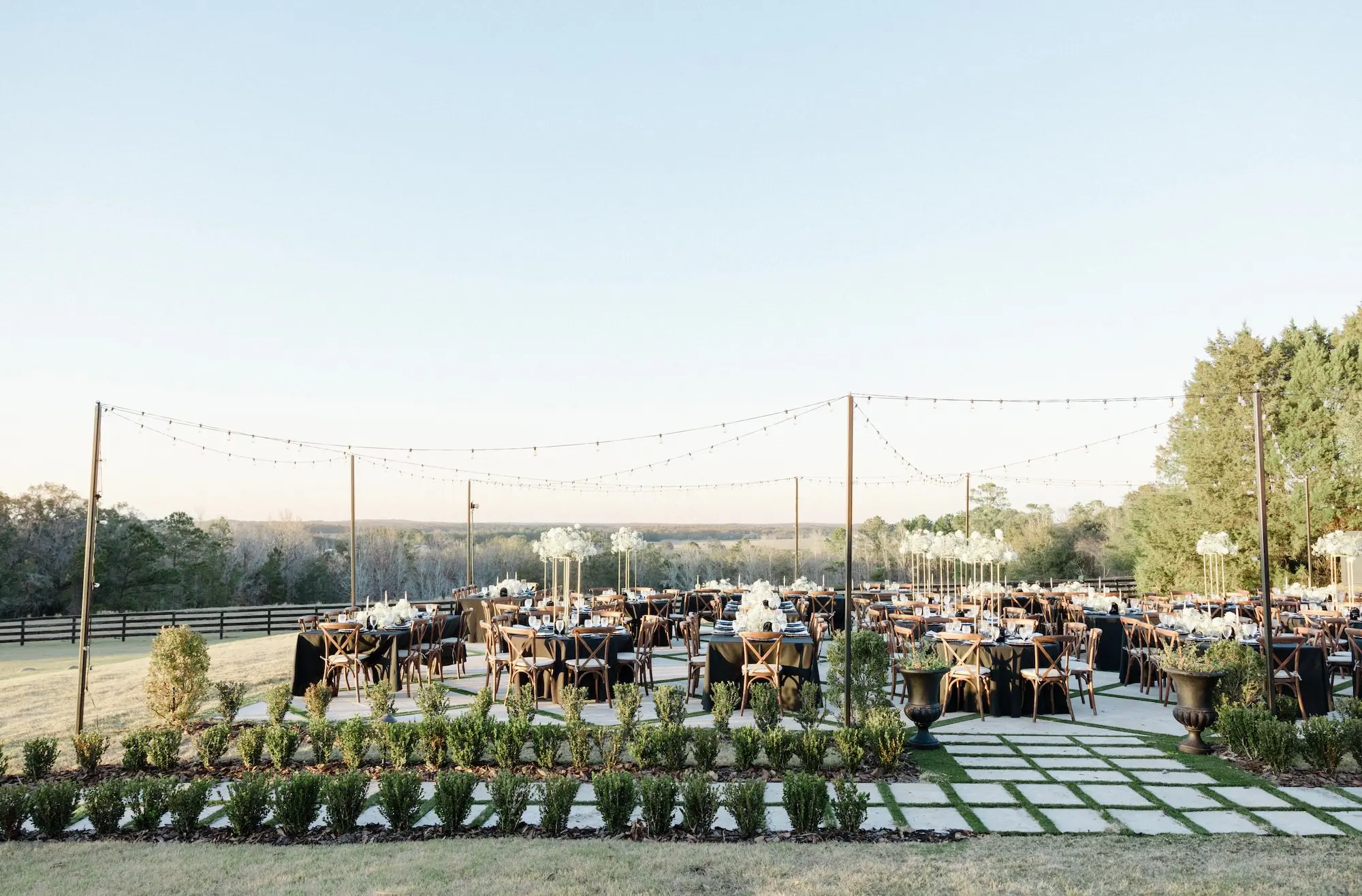 Outdoor European Inspired Black and White Winter Wedding with Travertine Terrace Reception Inspiration | Brooksville Event Venue La Hacienda on Snow Hill