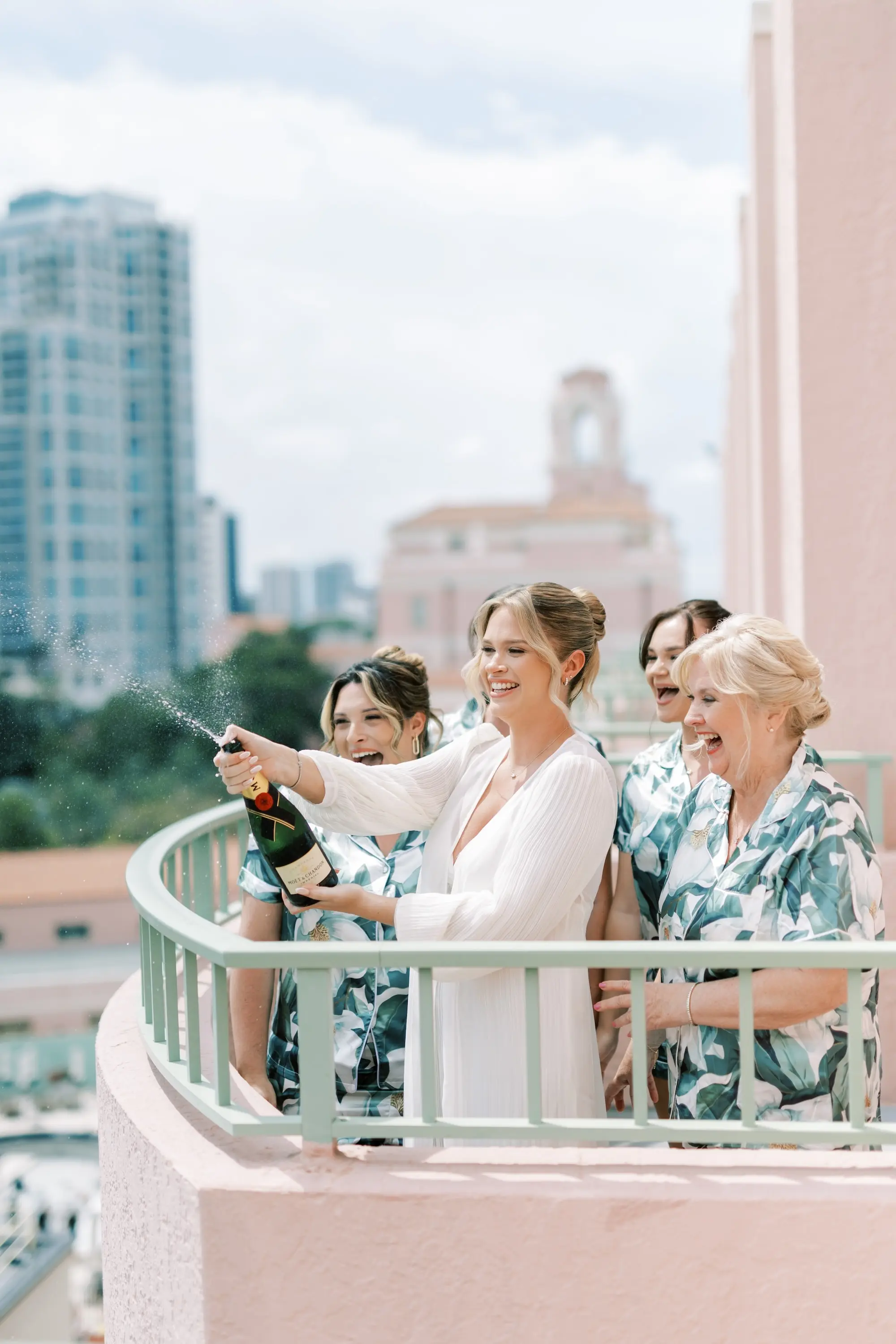 Bride and Bridesmaids Getting Ready Champagne Wedding Portrait