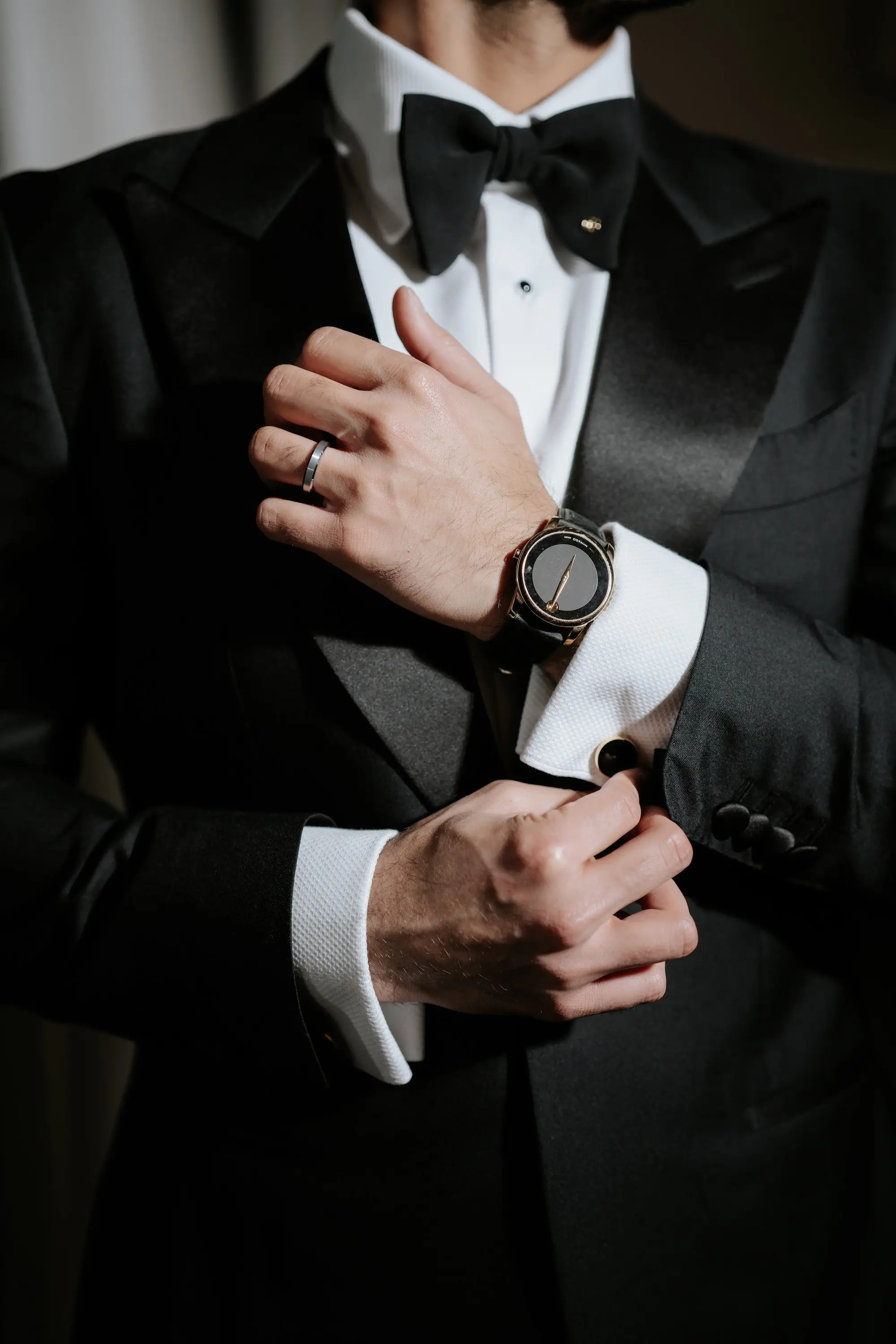 Groom in Black Tuxedo Wedding Attire Ideas