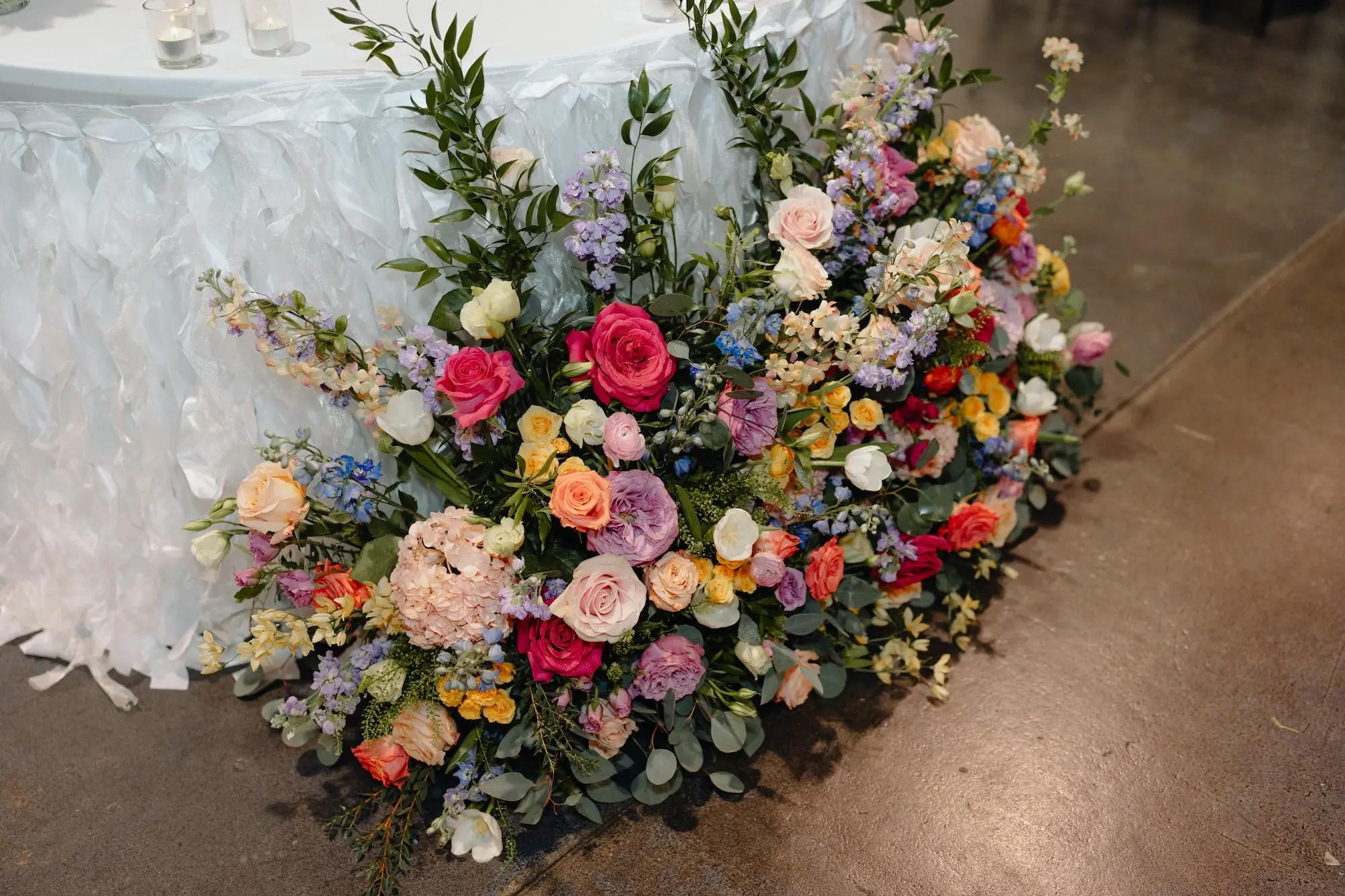 Romantic Colorful Spring Wedding Reception Floral Decor Inspiration | Pink, Blue, Purple, and Yellow Flowers with Greenery