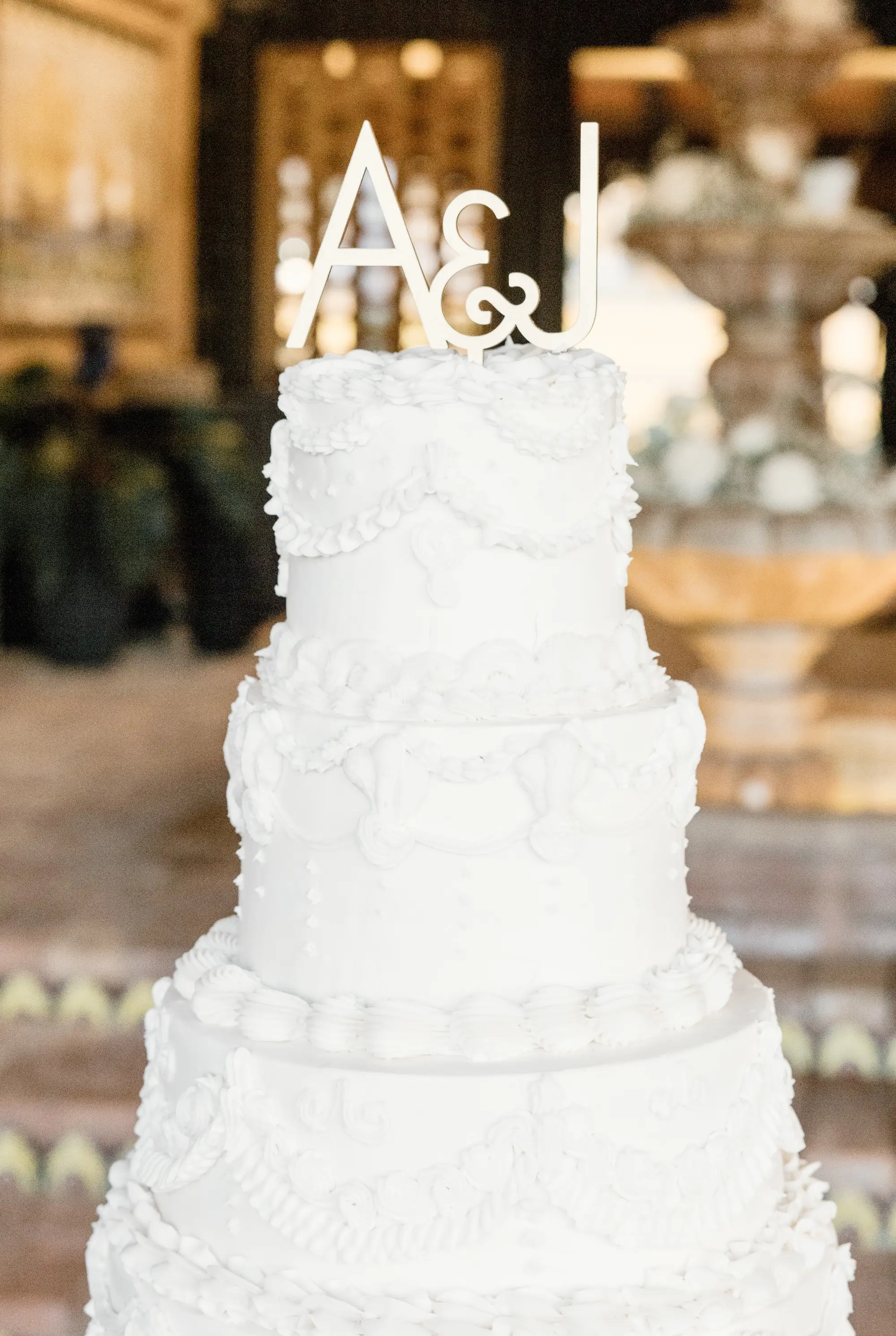 Four-Tiered Monochromatic White Wedding Cake with White Letter Cake Topper Inspiration