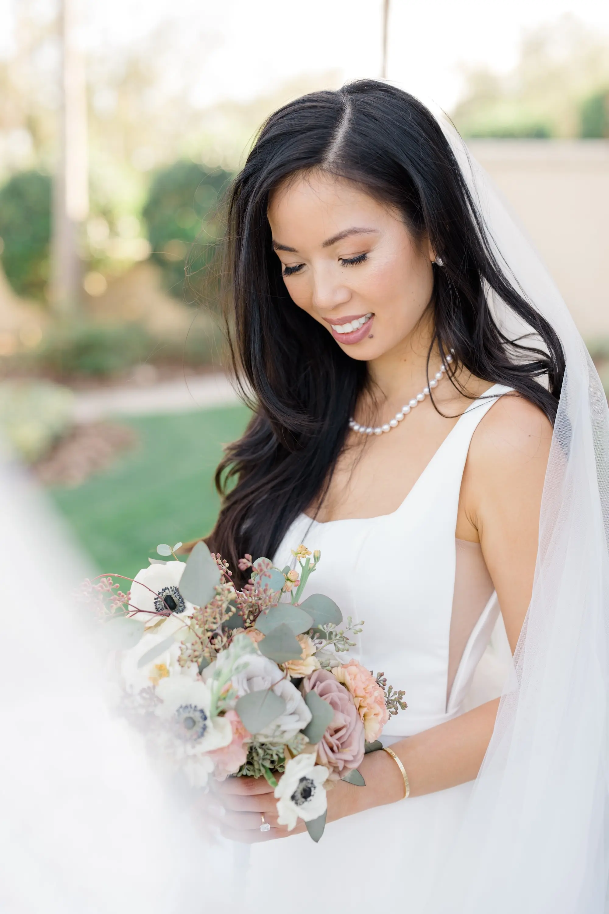 37Romantic Pastel and Navy Sarasota Wedding Inspiration jpg - “Best Of” 2025: Wedding Portraits Bride Wedding Portrait | Elegant Paloma Blanca Wedding Gown with Square Neckline and Traditional Chapel Length Tulle Veil Inspiration | Lush White and Blush Floral Arrangement Ideas | Susan Elizabeth Weddings Tampa Wedding Photographer
