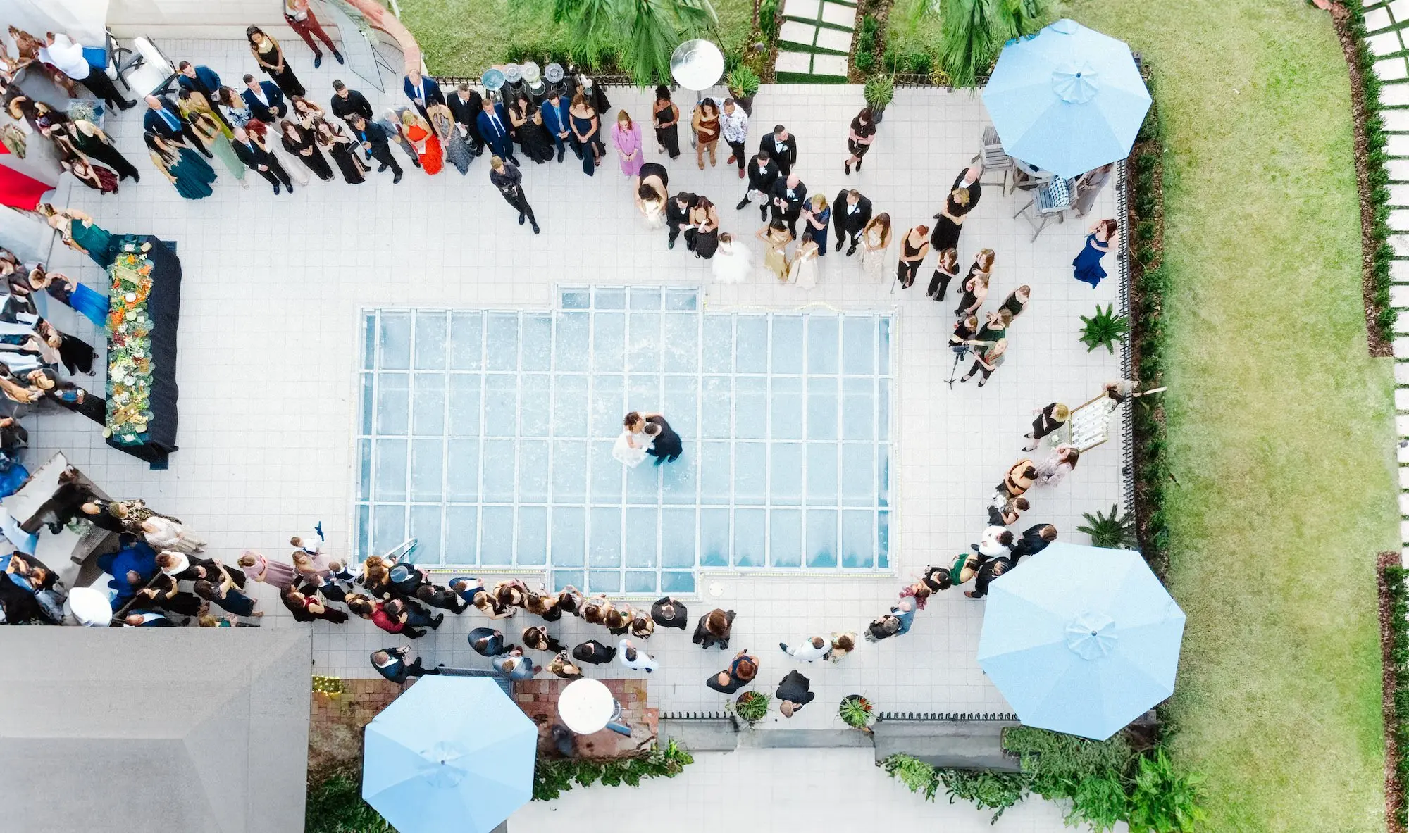 Bride and Groom First Dance Wedding Portrait | Outdoor European Inspired Winter Wedding with Travertine Terrace Reception Inspiration | Dance Floor over Pool Ideas | Brooksville Event Venue La Hacienda on Snow Hill