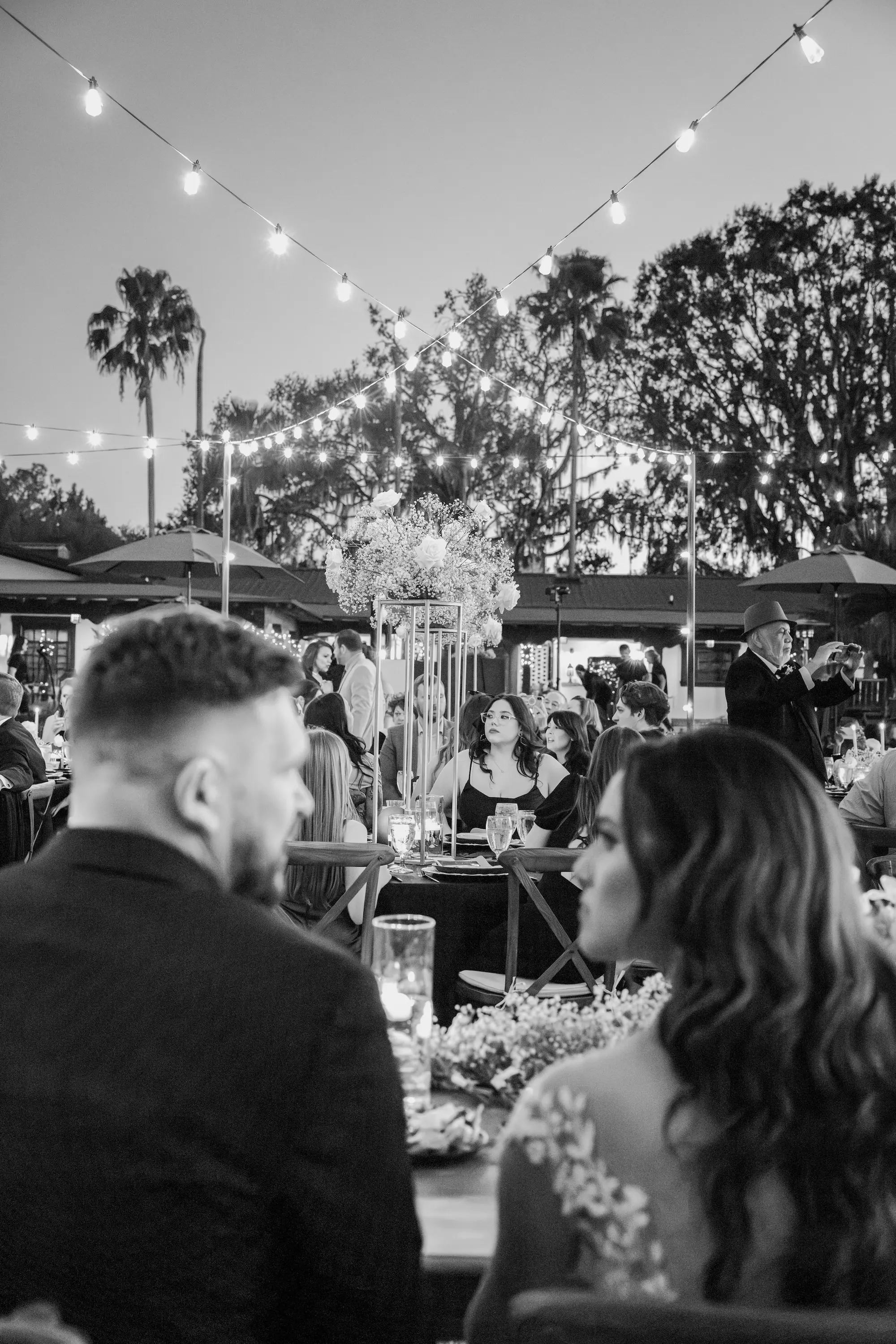Bride and Groom Sweetheart Table Wedding Reception Inspiration | String Light Reception Decor Ideas | Black and White Classic European Style Estate Wedding Inspiration