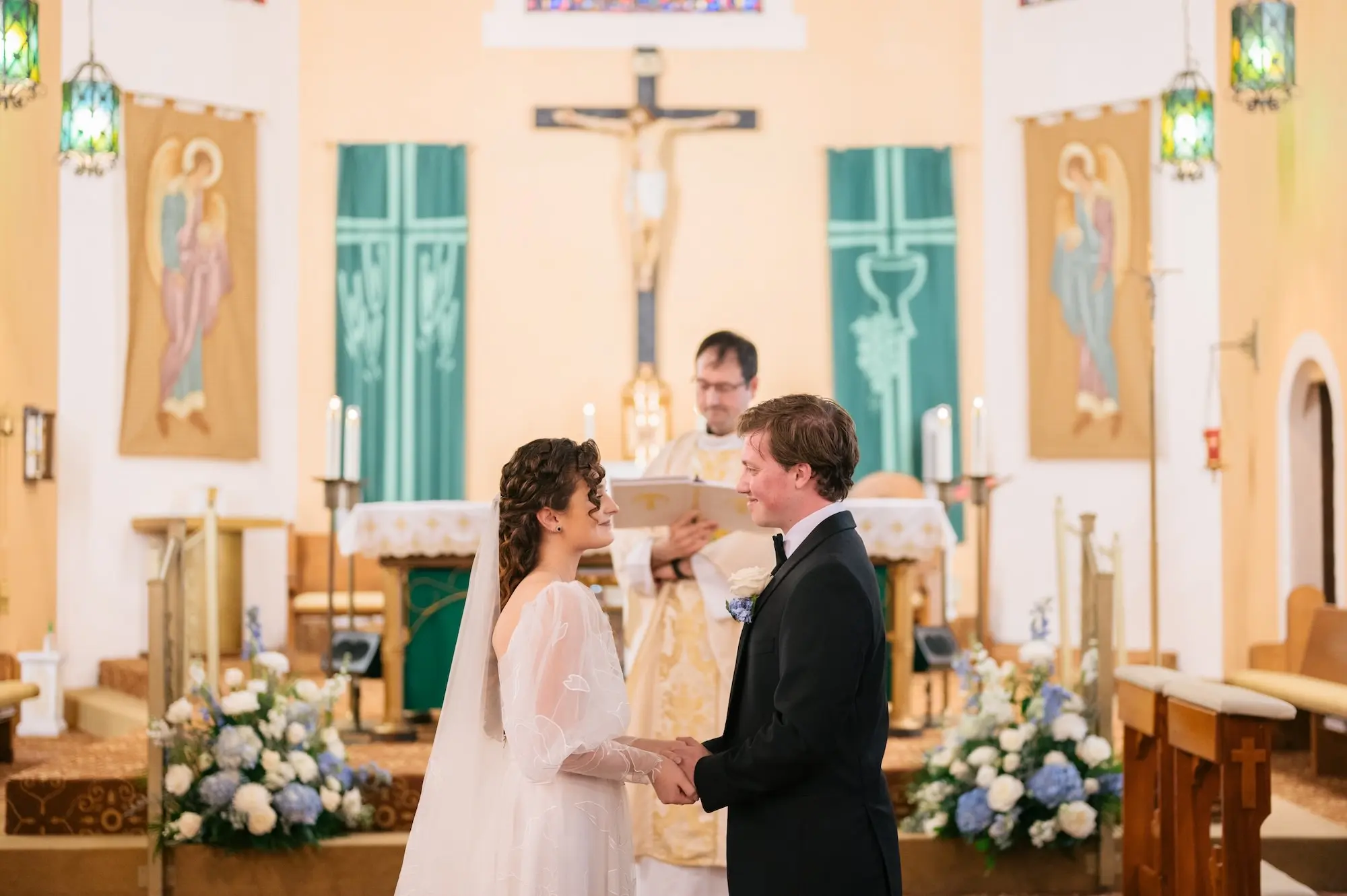 Bride and Groom Wedding Ceremony Vow Exchange Wedding | Ceremony Wedding Venue St. Mary Our Lady of Grace Catholic Church in St. Petersburg | Traditional Catholic Wedding Venue Tampa Bay