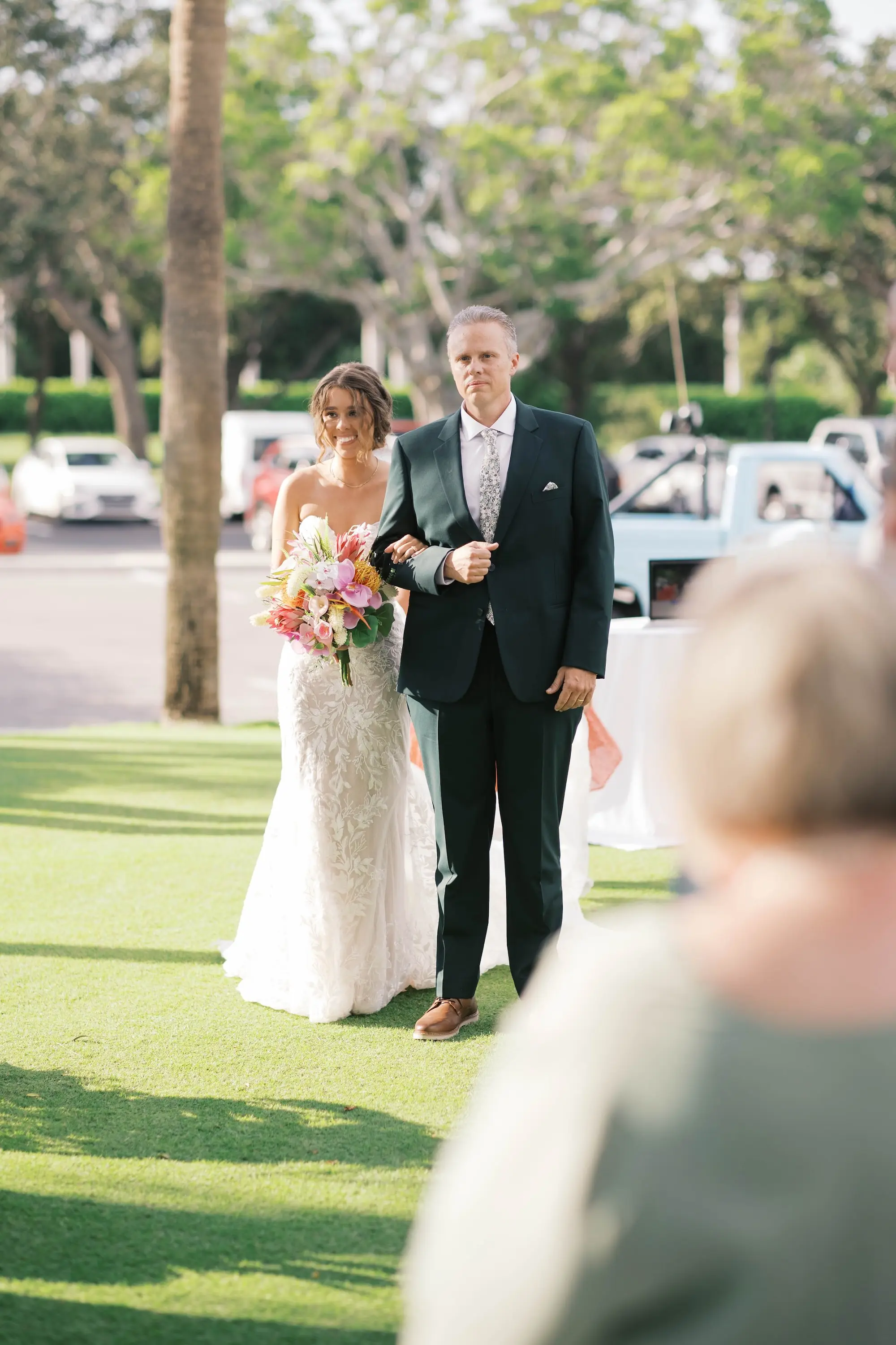 Bride and Father Walking Down Wedding Aisle