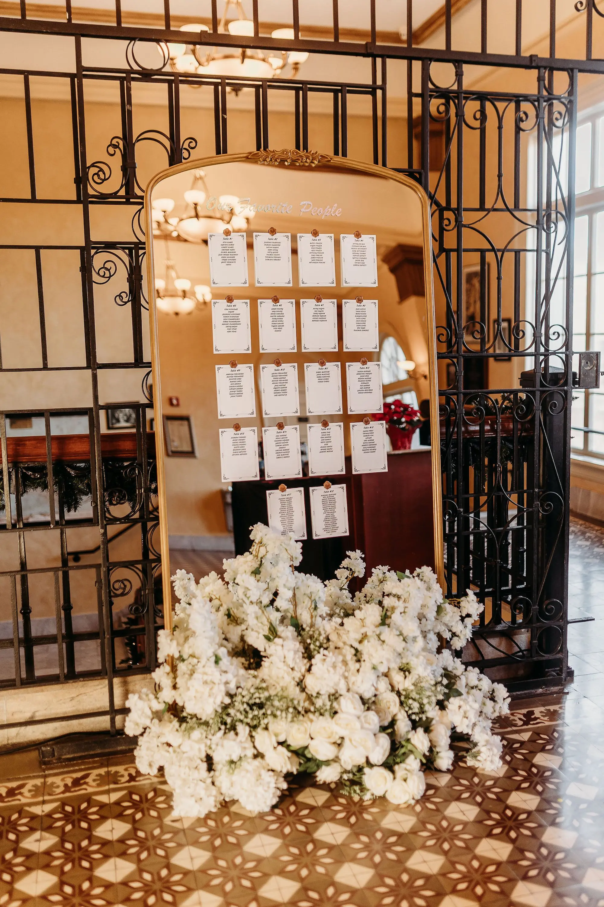 23Classic Gold Italian Inspired Wedding Ideas - Classic, Gold Tampa Wedding | The Italian Club of Tampa Vintage Gold Framed Mirror Wedding Reception Seating Chart Decor Inspiration | Monochromatic White Roses and Florals Reception Decor Ideas