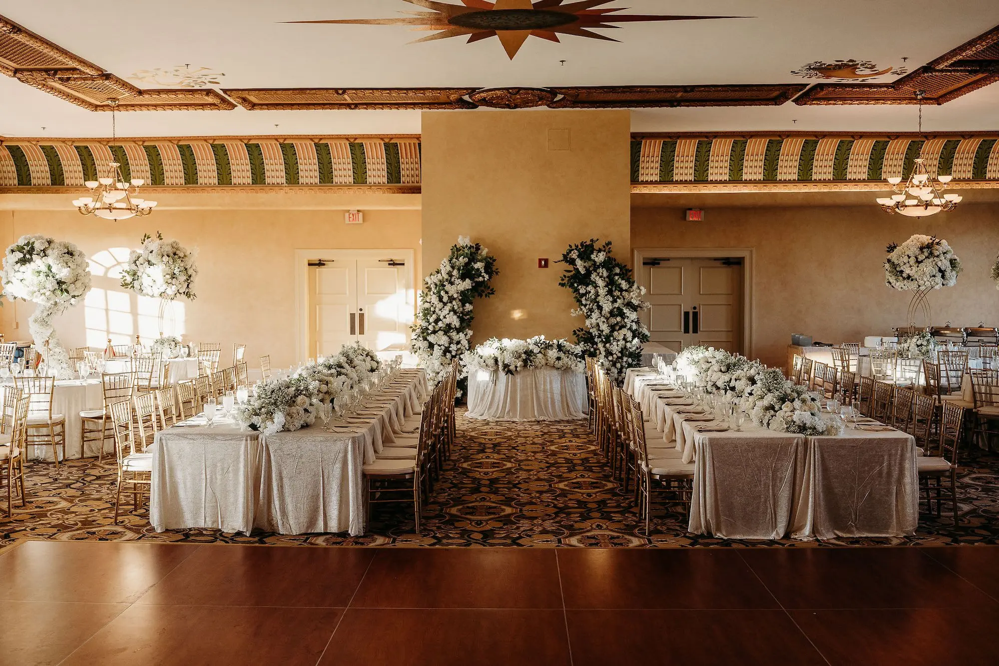 26Classic Gold Italian Inspired Wedding Ideas Tampa Venue Italian Club - Classic, Gold Tampa Wedding | The Italian Club of Tampa Elegant Old World Italian Inspired Ballroom Wedding Reception | Chiavari Gold Chairs | White Hydrangeas, Roses, and Baby's Breath with Greenery Wedding Reception Long Table Garland Arrangement Ideas | Downtown Tampa Ybor City Wedding Venue Italian Club