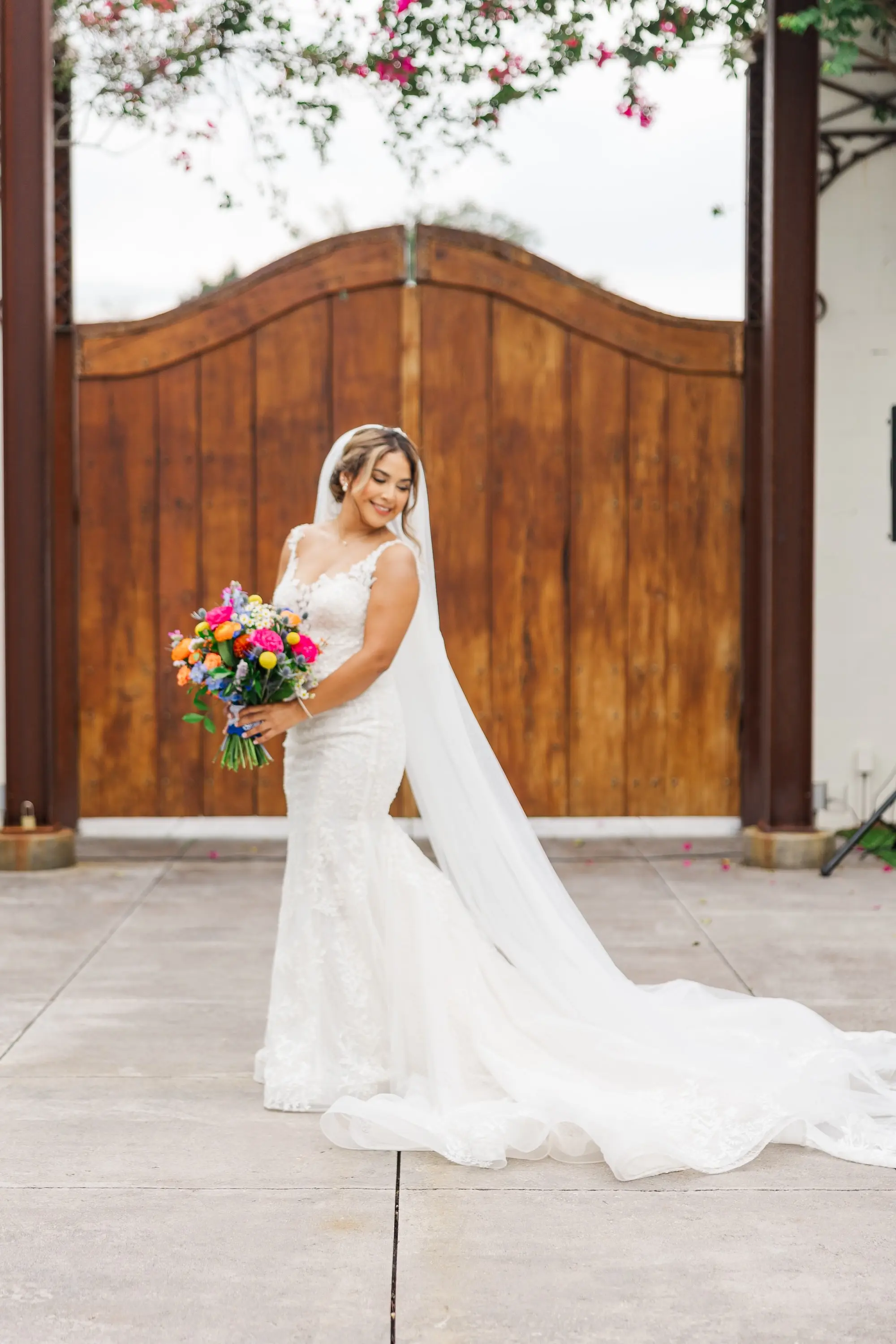 2Vibrant Blue Mexican Wedding Ideas - “Best Of” 2025: Wedding Portraits Bride Wedding Portrait | Vibrant Pink, Yellow, Orange, White, Green Bridal Bouquet Ideas | Traditional Cathedral Length Chiffon Veil Inspiration | White Romantic A-line Fitted Wedding Gown with Full Skirt Ideas | Tampa Bay Photographer Mary Anna Photography