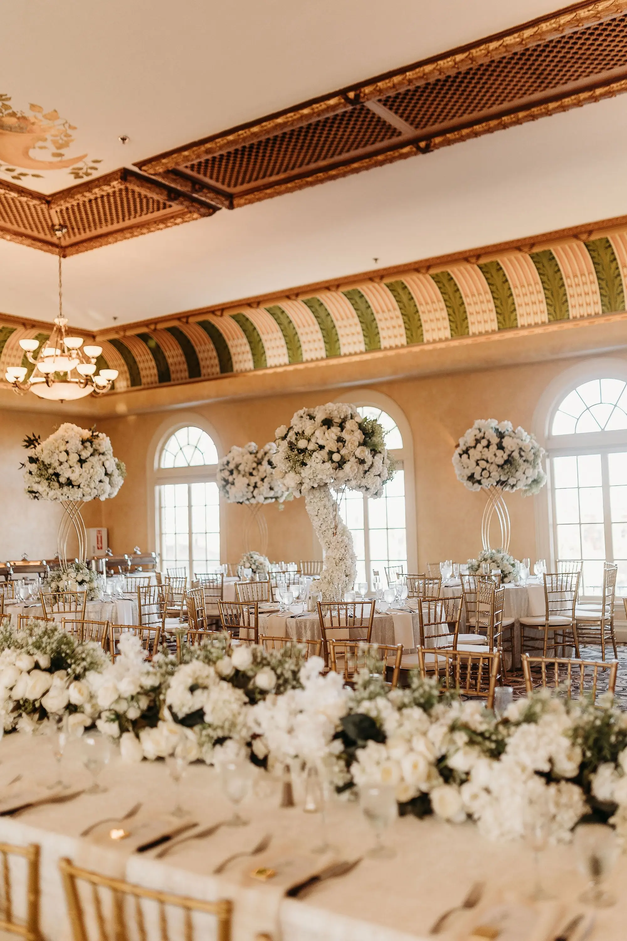 35Classic Gold Italian Inspired Wedding Ideas - Classic, Gold Tampa Wedding | The Italian Club of Tampa Elegant Old World Italian Inspired Ballroom Wedding Reception | Chiavari Gold Chairs | Tall Lush Centerpieces with White Hydrangeas, Roses, and Greenery Flower Arrangement Ideas | Downtown Tampa Ybor City Wedding Venue Italian Club