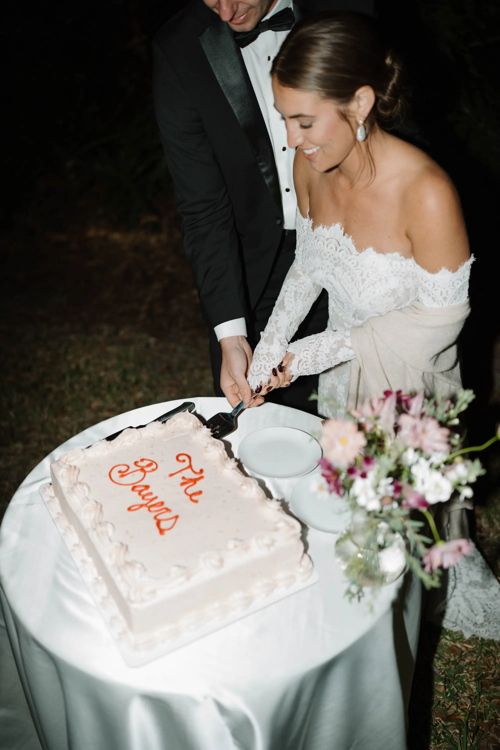 Bride and Groom Cake Cutting Wedding Portrait