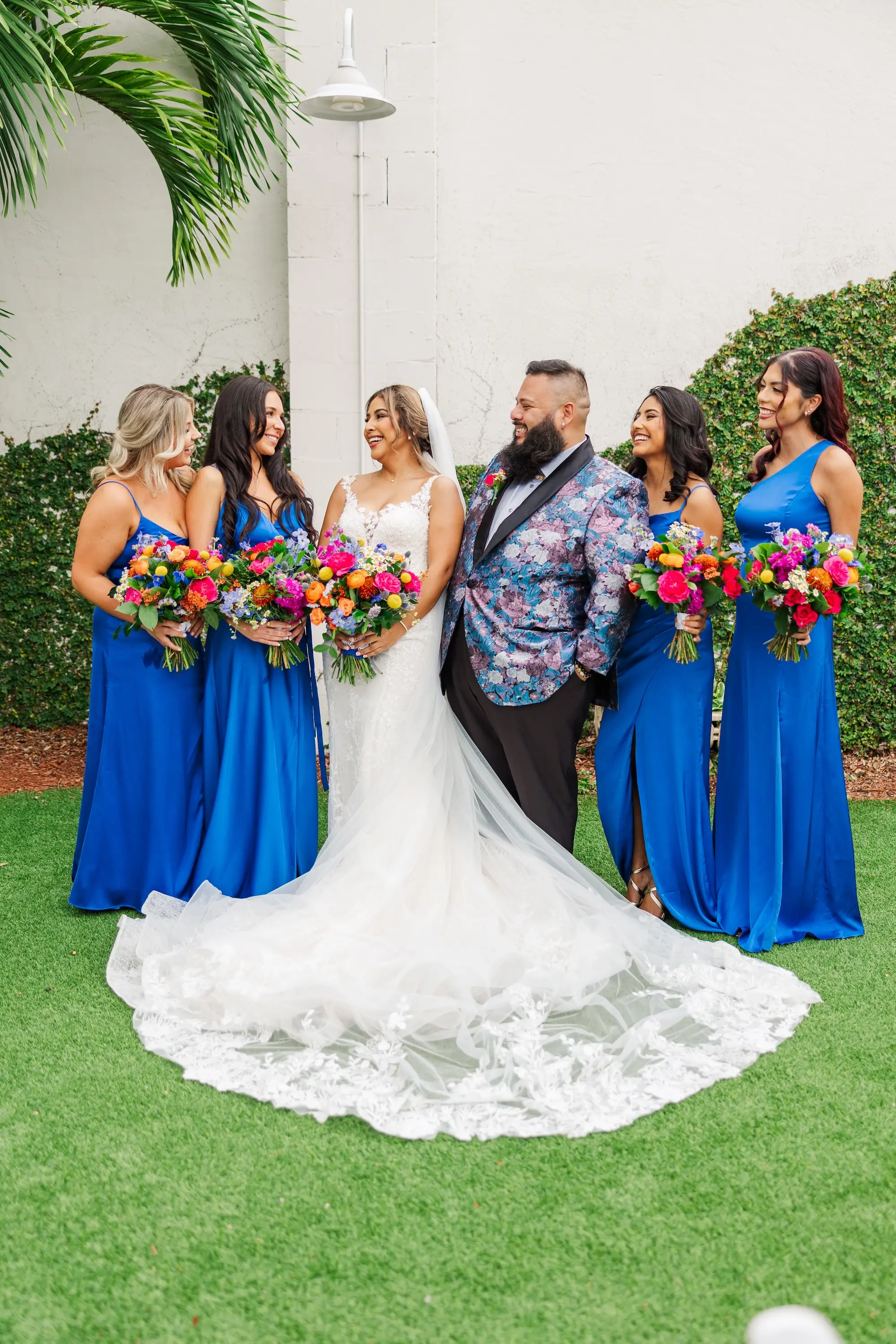 4Vibrant Blue Mexican Wedding Ideas - “Best Of” 2025: Wedding Portraits Bride and Bridesmaids Wedding Portrait | Different Style Satin Bright Blue Bridesmaid Dresses Inspiration | Man of Honor Floral Tuxedo Suit Jacket Ideas | Tampa Bay Photographer Mary Anna Photography