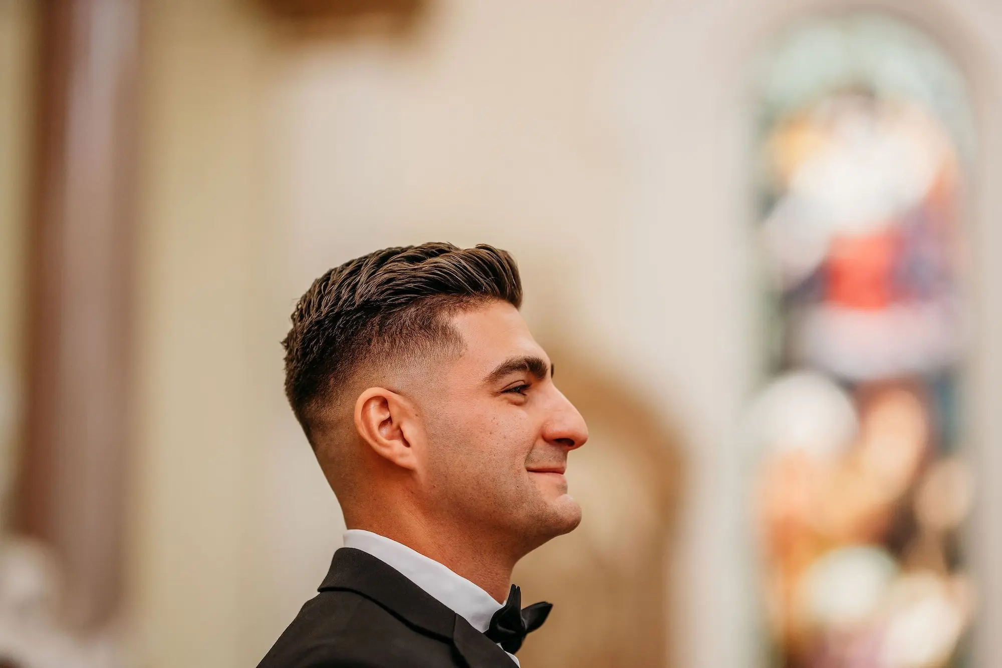 9Classic Gold Italian Inspired Wedding Ideas - Classic, Gold Tampa Wedding | The Italian Club of Tampa Groom's Reaction to Bride Walking Down Wedding Ceremony Aisle | Classic Black and White Groom Tuxedo Inspiration | Sacred Heart Catholic Church Wedding Ceremony Venue | Traditional Catholic Wedding Ceremony Event Ideas | Tampa Bay Photographer Sabrina Autumn Photography