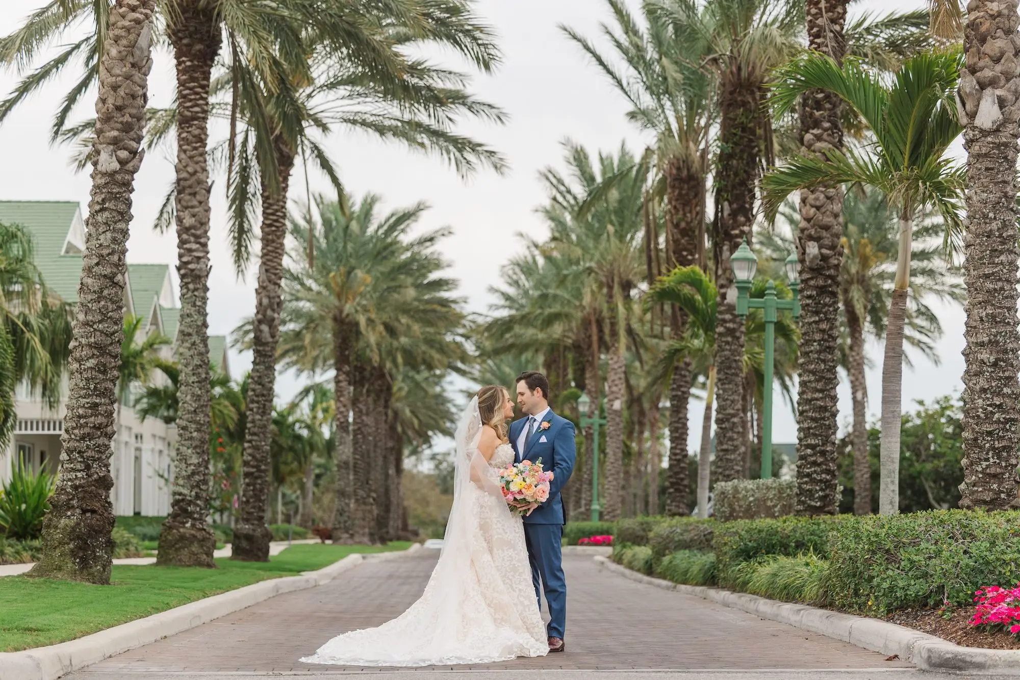 Bride and Groom First Look Wedding Portrait | Romantic Bridal Bouquet of Pastel Dusty Blue, Pink, Peach, Yellow Florals | Tampa Bay Florist Bruce Wayne Florals | Clearwater Photographer Mary Anna Photography | Tampa Bay Event Venue Belleview Inn