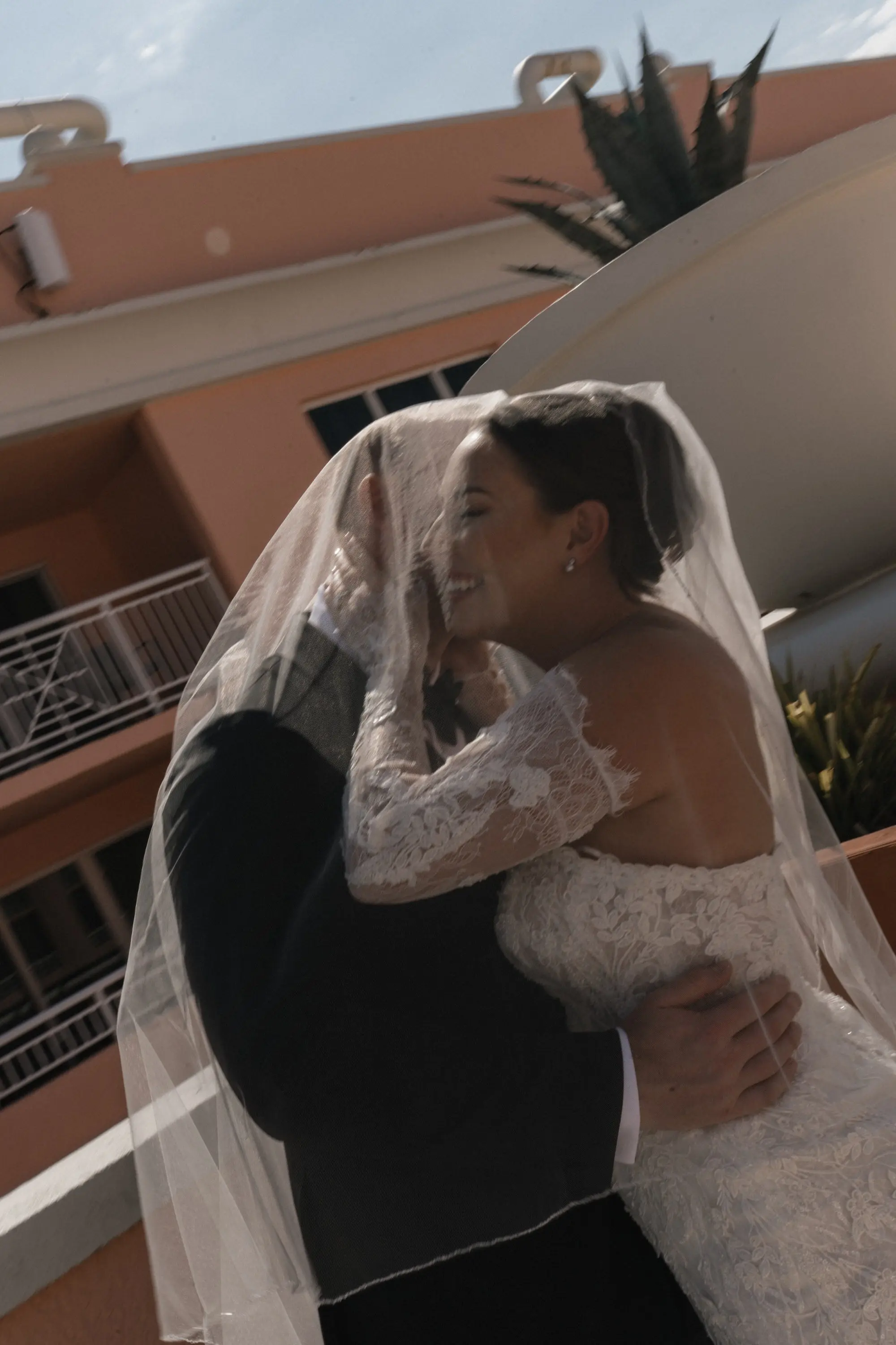 11Modern Disco Themed Florida Wedding Inspiration - Romantic Disco-Themed Florida Wedding | Hyatt Regency Clearwater Beach Bride and Groom in Veil Wedding Portrait | Tampa Bay Photographer Amber Yonker Photography | Florida Videographer Iyrus Weddings