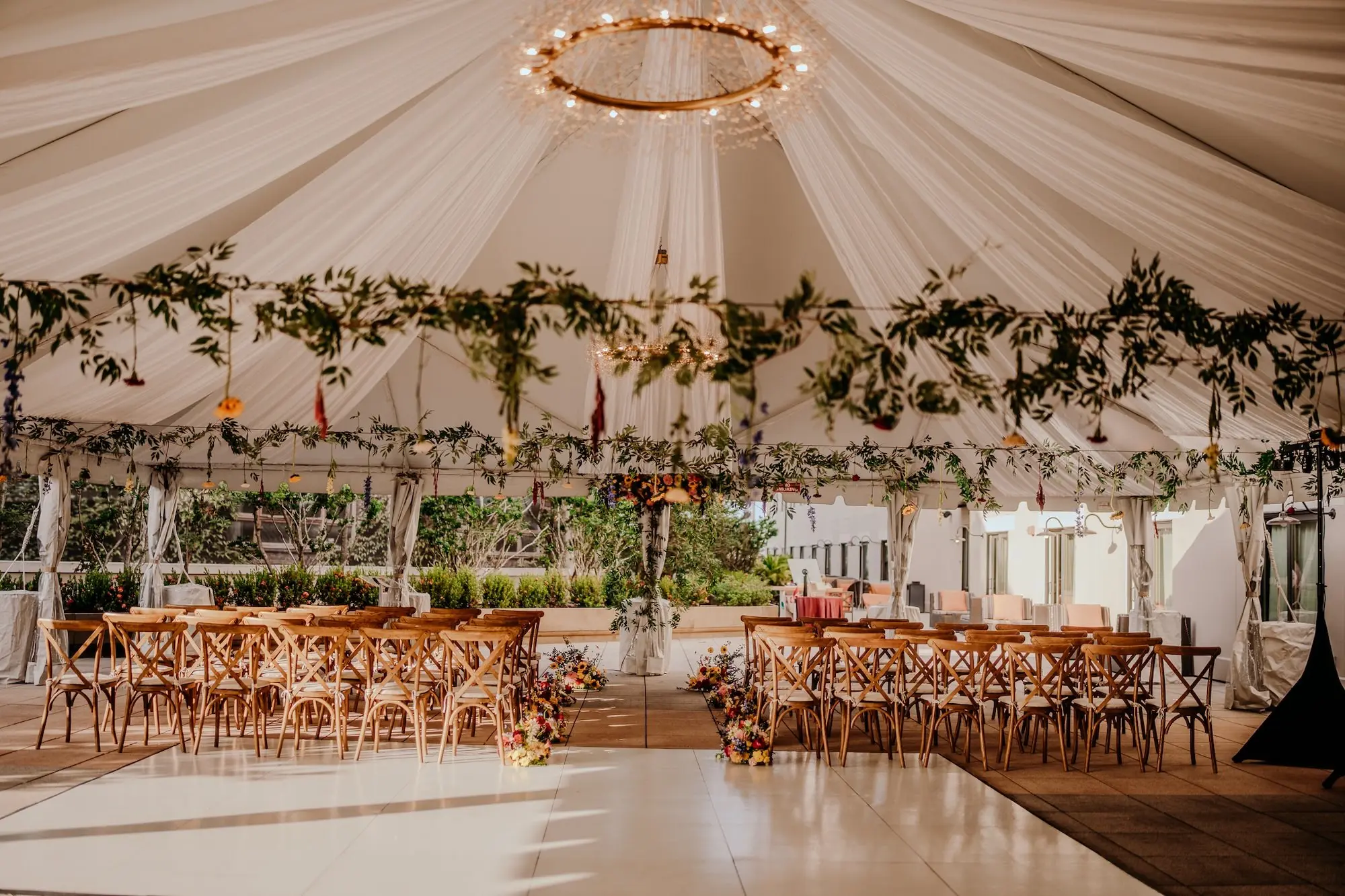 Colorful Floral Filled Tented Wedding Ceremony Decor Ideas | Greenery Garland, Pink and Yellow Flowers | Tampa Bay Event Venue The Epicurean | Planner Wilder Mind Events