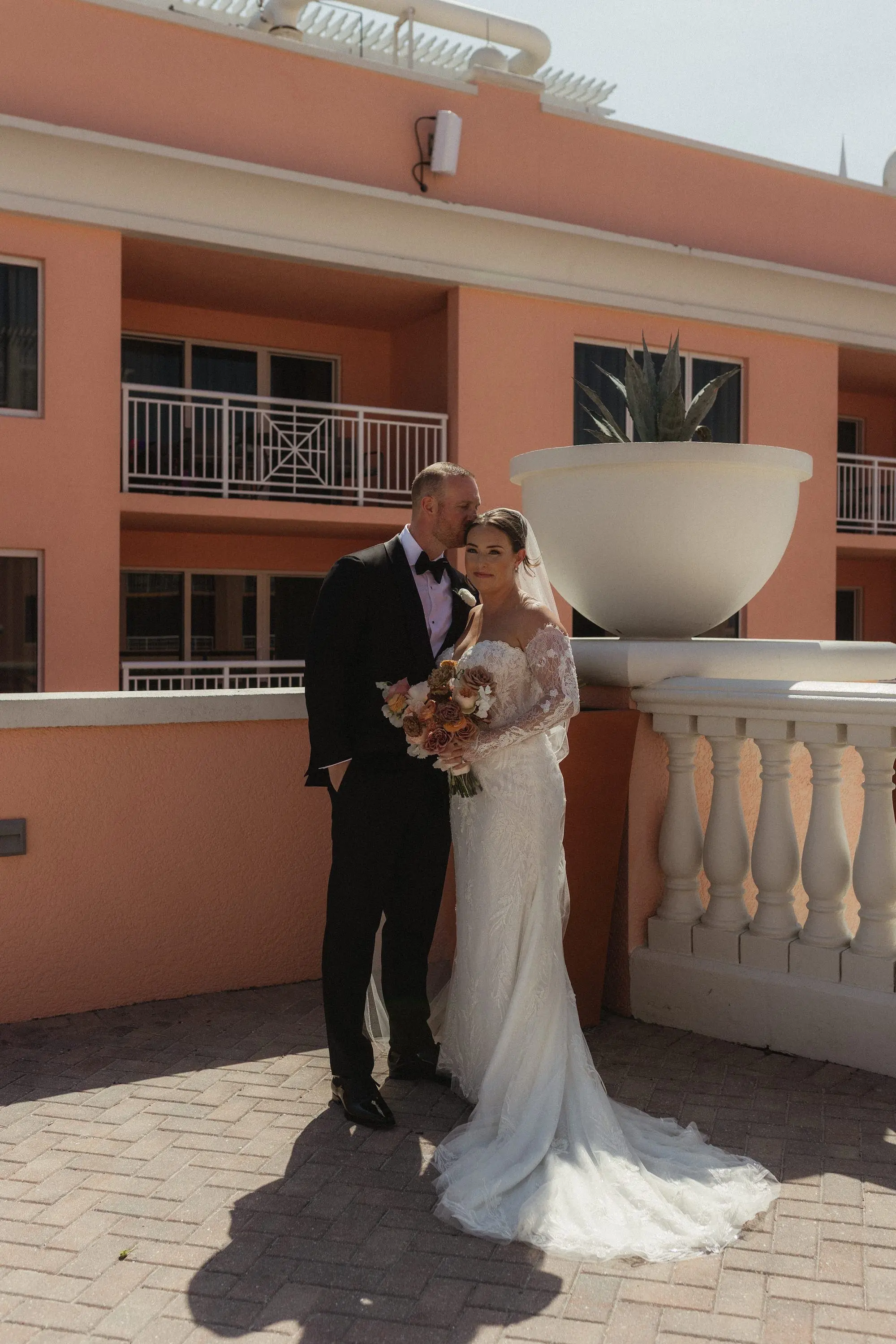 12Modern Disco Themed Florida Wedding Inspiration - Romantic Disco-Themed Florida Wedding | Hyatt Regency Clearwater Beach Bride and Groom Balcony Wedding Portrait | Tampa Bay Photographer Amber Yonker Photography | Florida Videographer Iyrus Weddings