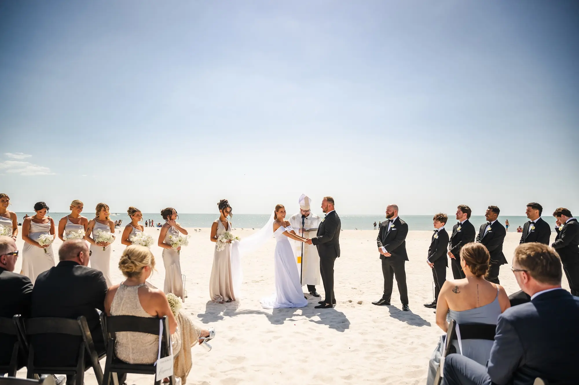 Bride and Groom Wedding Ceremony Vow Exchange Wedding | Classic Champagne and Black Florida Beach Wedding Ceremony Inspiration | Tampa Bay Event Venue TradeWinds Island Resort
