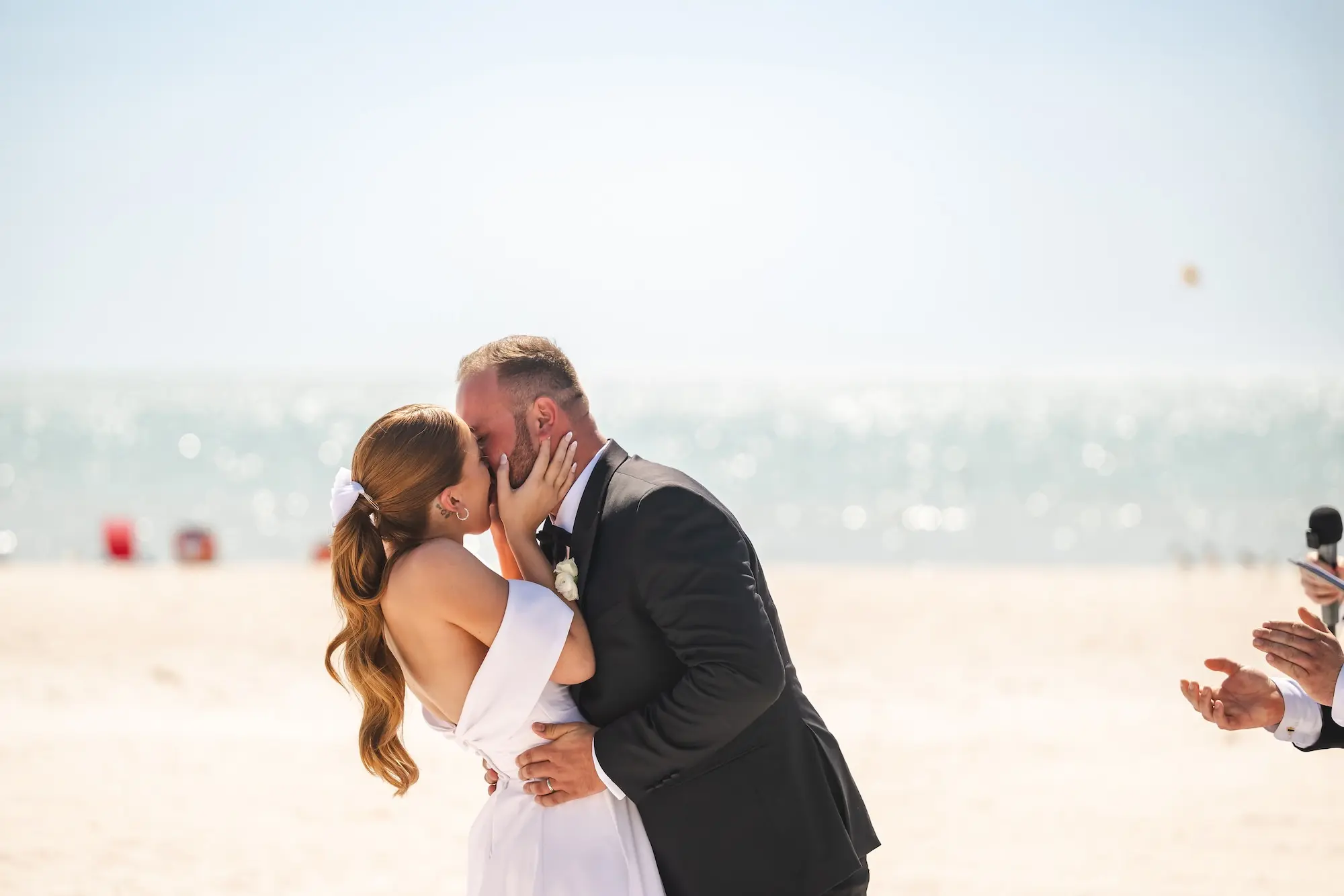 Bride and Groom First Kiss Beach Wedding Portrait | Tampa Bay Photographer Videographer Iyrus Weddings