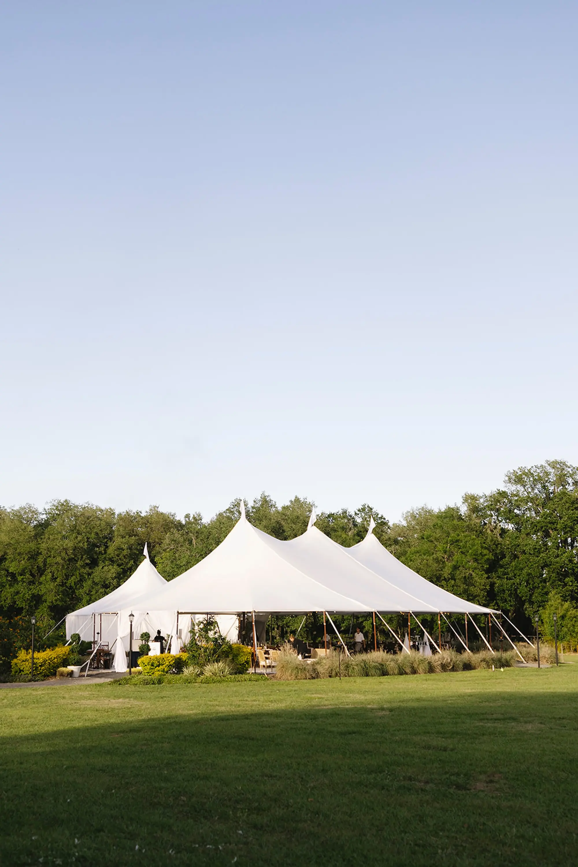 Estate Green Outdoor Tented Wedding Reception Inspiration | Lush Green Hanging Plants Wedding Reception Decor Ideas | Tampa Bay Venue Mill Pond Estate