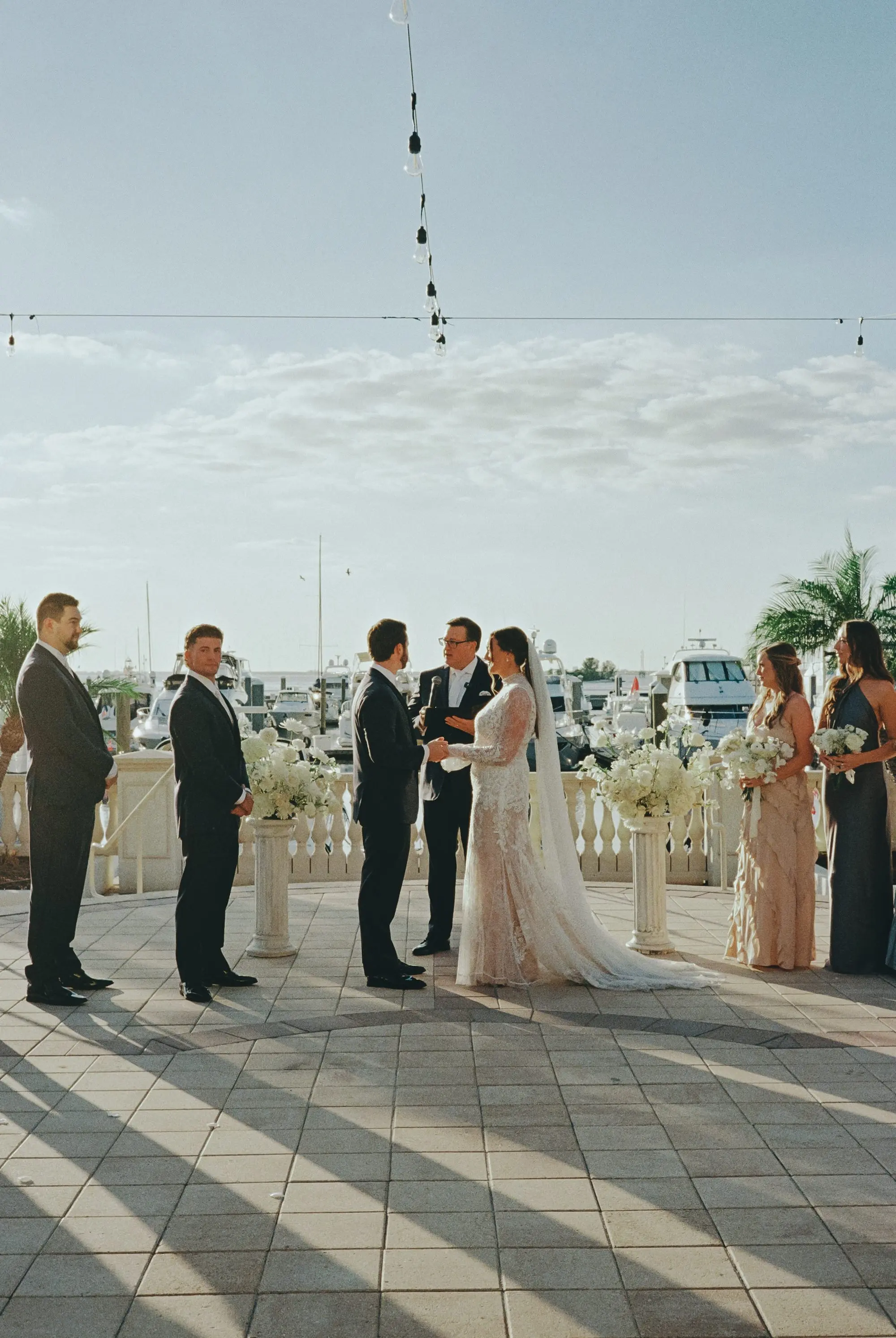 White and Gold Waterfront Wedding Ceremony Inspiration | Tampa Bay Event Venue Westshore Yacht Club | Photographer Amber Yonker Photography | Videographer Pine and Forge