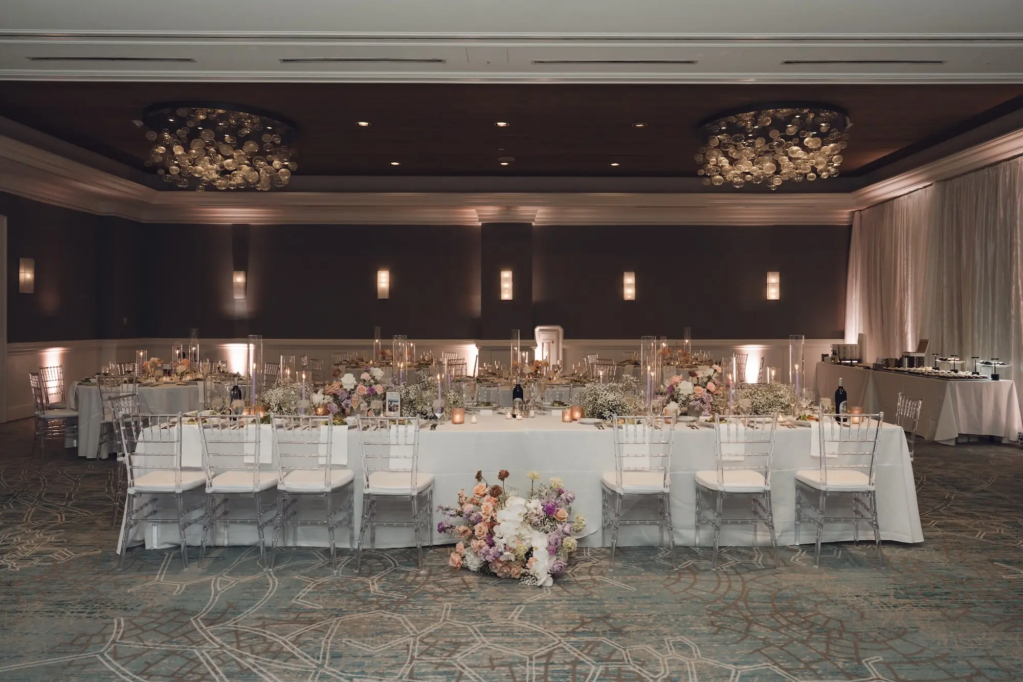 31Modern Disco Themed Florida Wedding Inspiration Venue Hyatt Regency Clearwater Beach - Romantic Disco-Themed Florida Wedding | Hyatt Regency Clearwater Beach Luxurious Ballroom Wedding Reception | Modern Ghost Clear Chiavari Chairs | Lush Short Centerpieces with White Peach, Purple, Lavender Flower Arrangement Ideas | Venue Hyatt Regency Clearwater Beach Resort and Spa