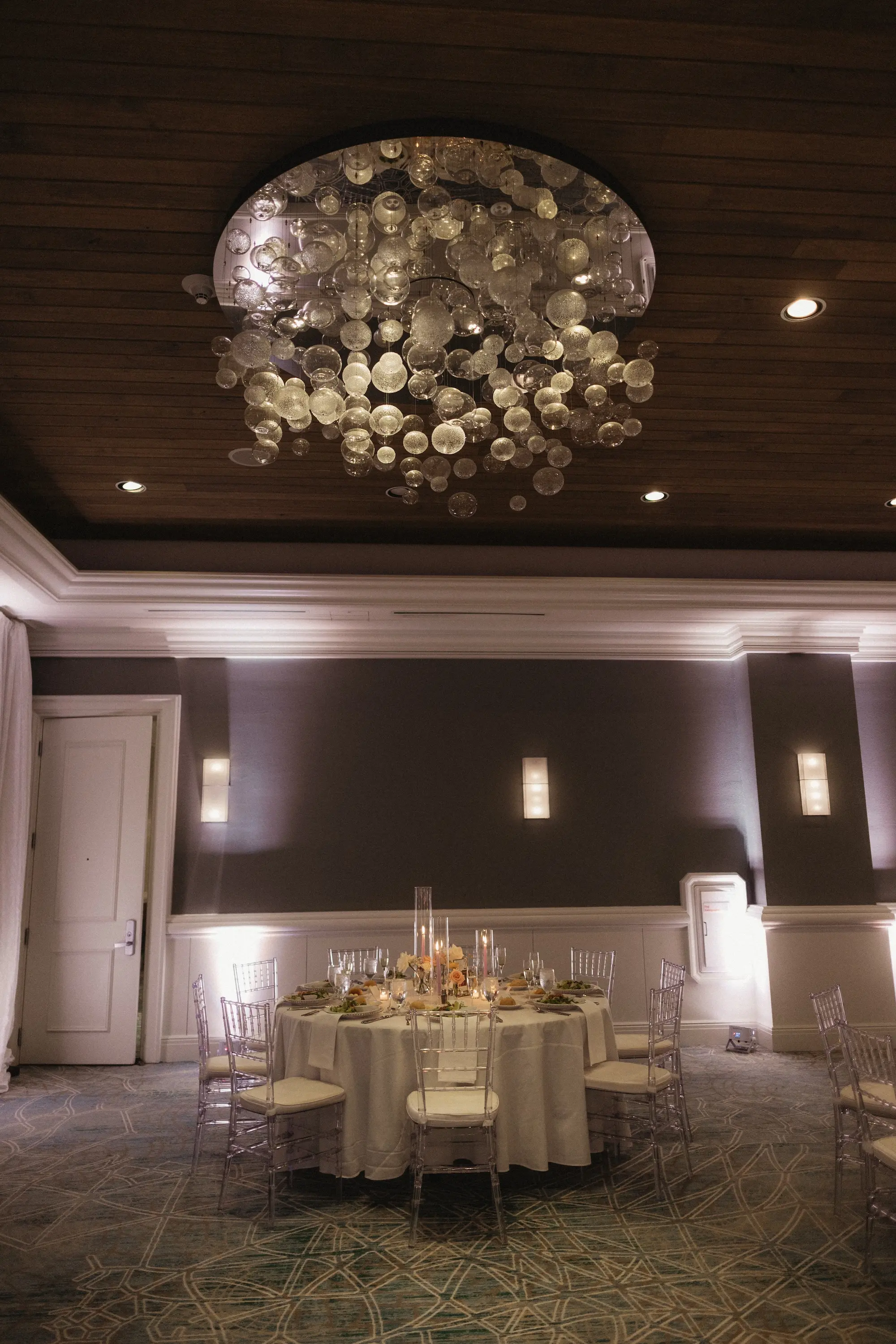 32Modern Disco Themed Florida Wedding Inspiration Venue Hyatt Regency Clearwater Beach - Romantic Disco-Themed Florida Wedding | Hyatt Regency Clearwater Beach Luxurious Ballroom Wedding Reception | Modern Ghost Clear Chiavari Chairs | Lush Short Centerpieces with White Peach, Purple, Lavender Flower Arrangement Ideas | Venue Hyatt Regency Clearwater Beach Resort and Spa