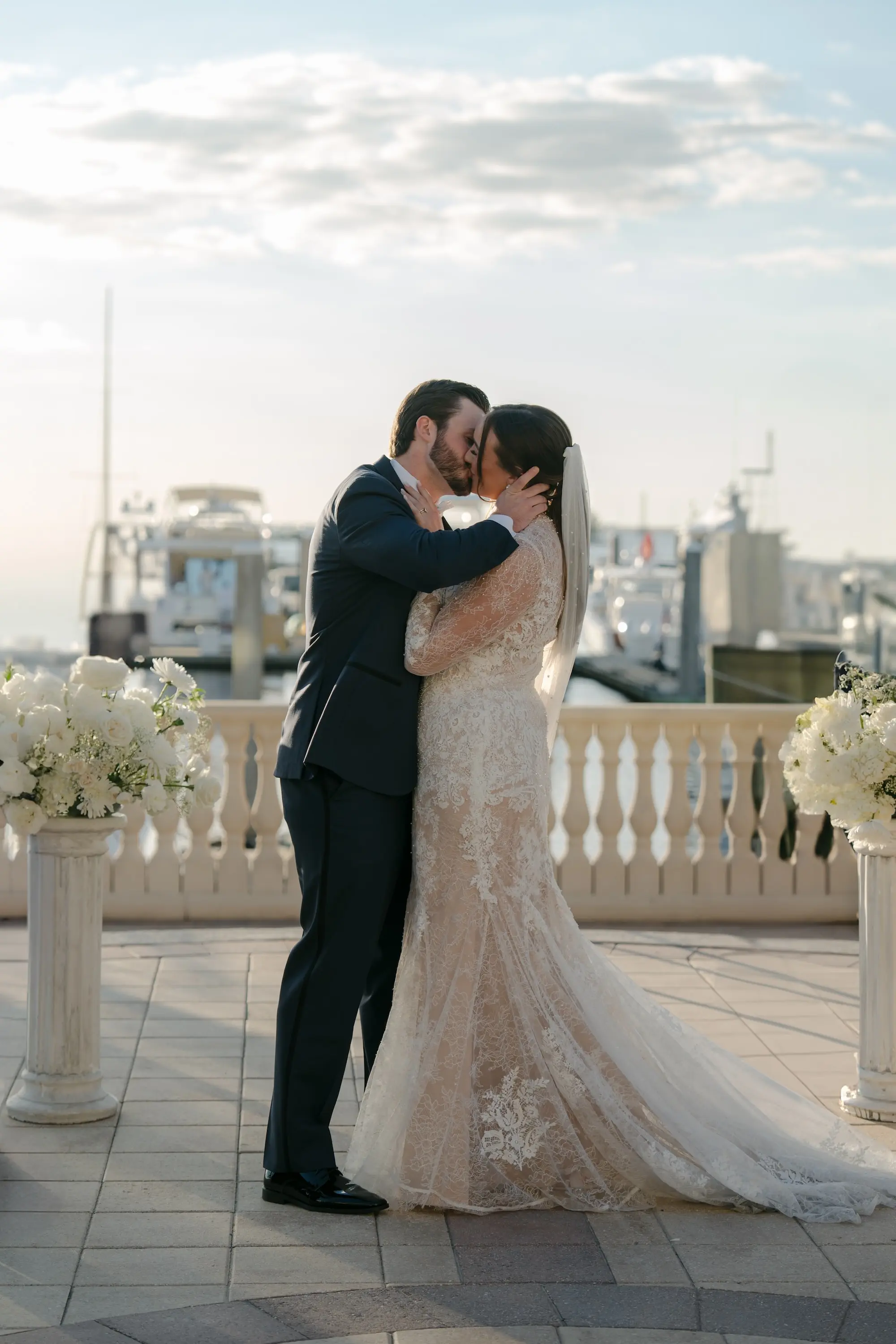 Bride and Groom First Kiss Wedding Portrait | Tampa Bay Photographer Amber Yonker Photographer | Event Venue Westshore Yacht Club | Videographer Pine and Forge