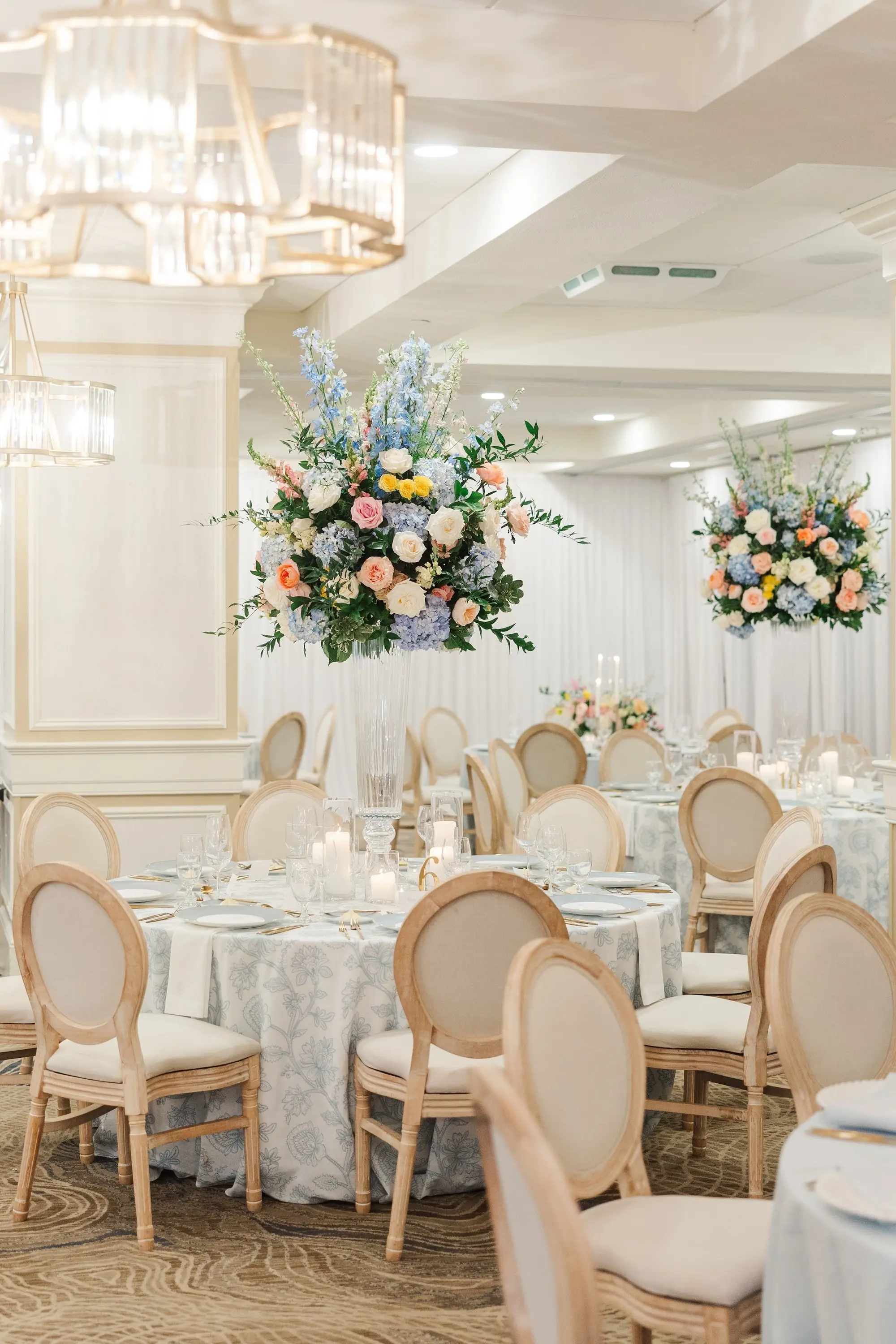 Blue Spring Garden Party Wedding Reception Ballroom Centerpiece Decor Inspiration | Blue, Pink, White, Yellow, and Orange Flowers | Clearwater Florist Bruce Wayne Florals | Tampa Bay Event Venue Belleair Country Club | Planner Parties a La Carte
