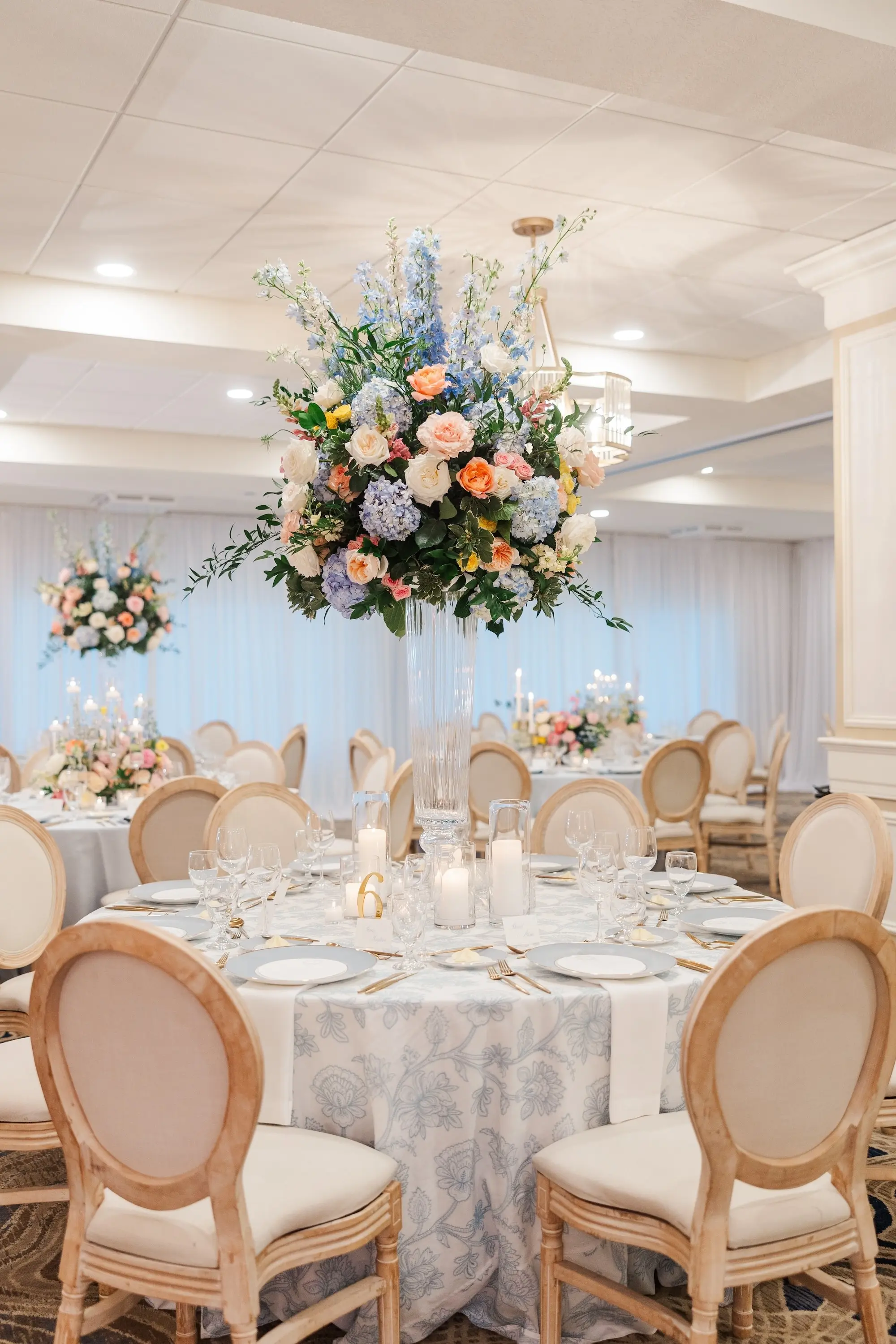 Blue Spring Garden Party Wedding Reception Centerpiece Decor Inspiration | Blue, Pink, White, Yellow, and Orange Flowers | Clearwater Florist Bruce Wayne Florals | Tampa Bay Event Venue Belleair Country Club